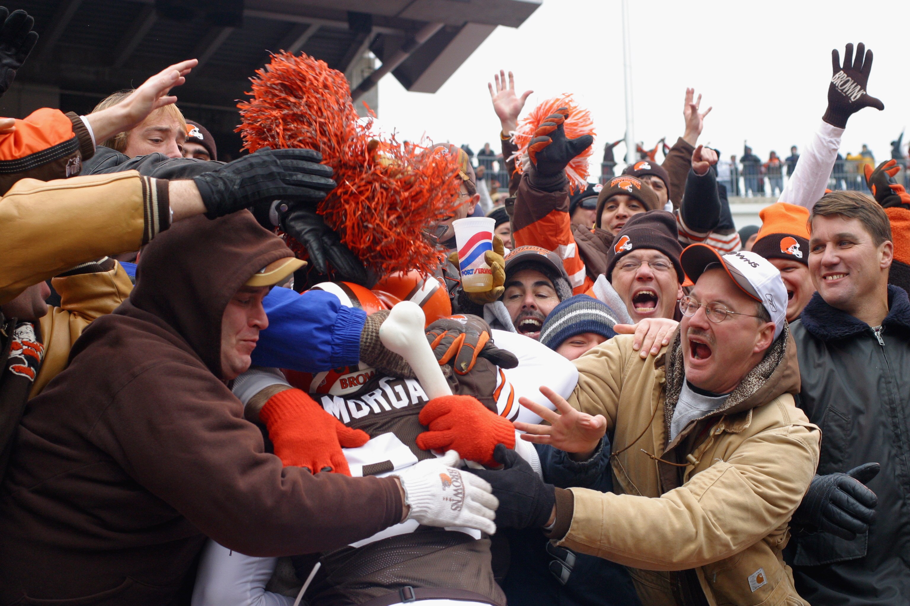 CLEVELAND - DECEMBER 15:  Wide receiver Quincy Morgan #81 of the Cleveland Browns celebrates his touchdown with the Dawg Pound during the game against the Indianapolis Colts at Cleveland Browns Stadium on December 15, 2002 in Cleveland, Ohio. The Colts wo