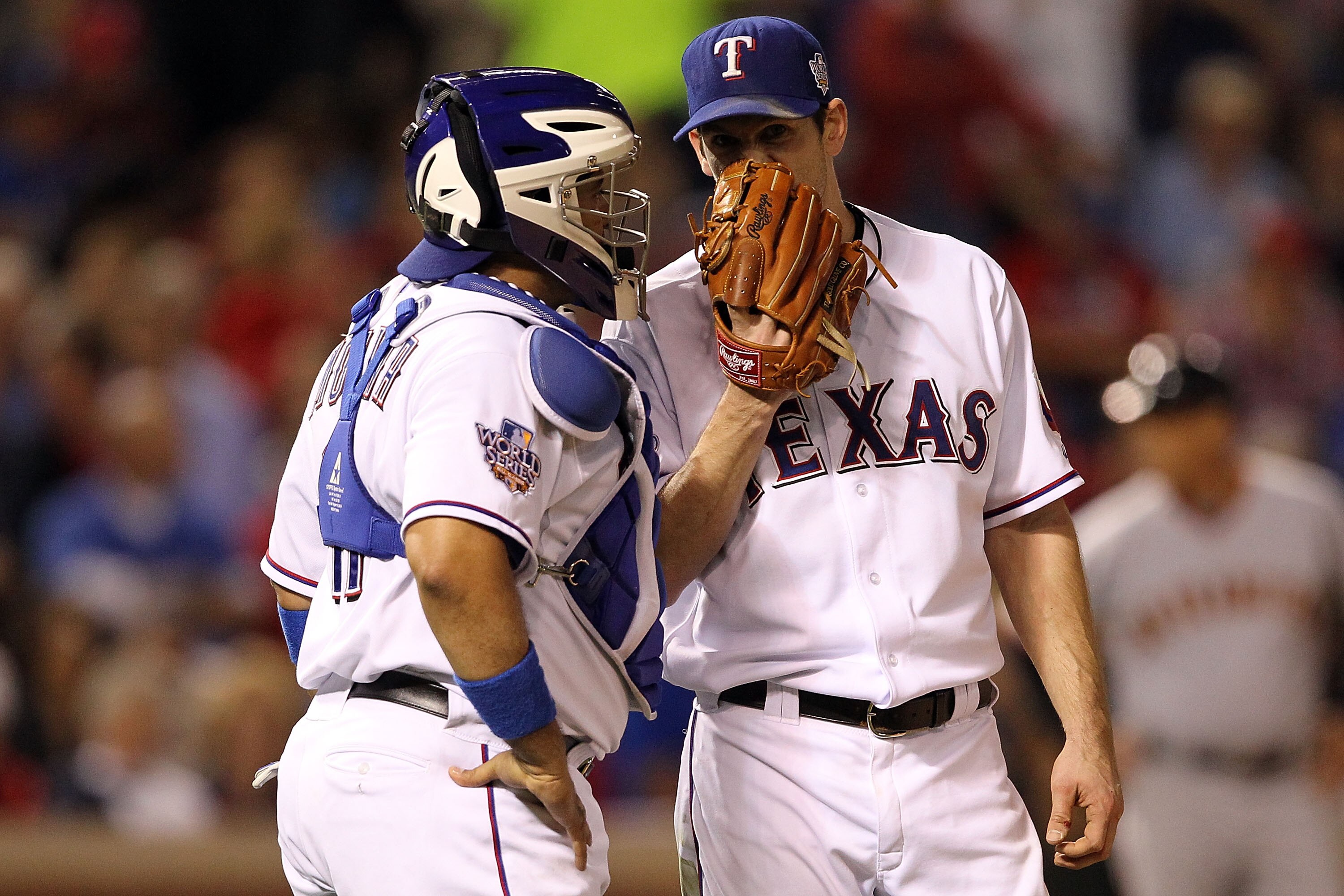 ARLINGTON, TX - NOVEMBER 01:  (L-R) Bengie Molina #11 and Cliff Lee #33 of the Texas Rangers talk on the mound against the San Francisco Giants in Game Five of the 2010 MLB World Series at Rangers Ballpark in Arlington on November 1, 2010 in Arlington, Te