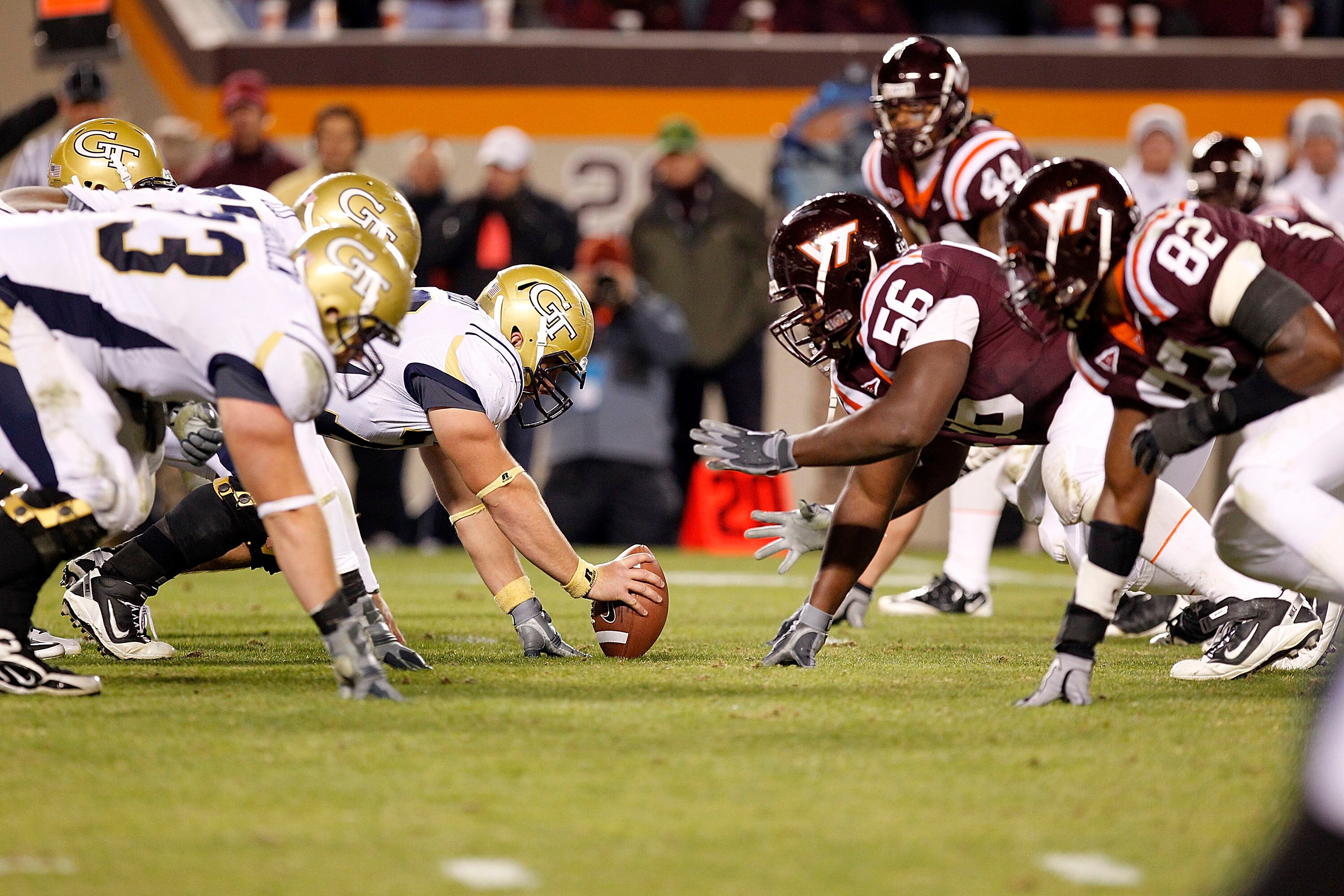BLACKSBURG, VA - NOVEMBER 04: Georgia Tech Yellow Jackets players line up against Virginia Tech Hokies players at Lane Stadium on November 4, 2010 in Blacksburg, Virginia.  (Photo by Geoff Burke/Getty Images)