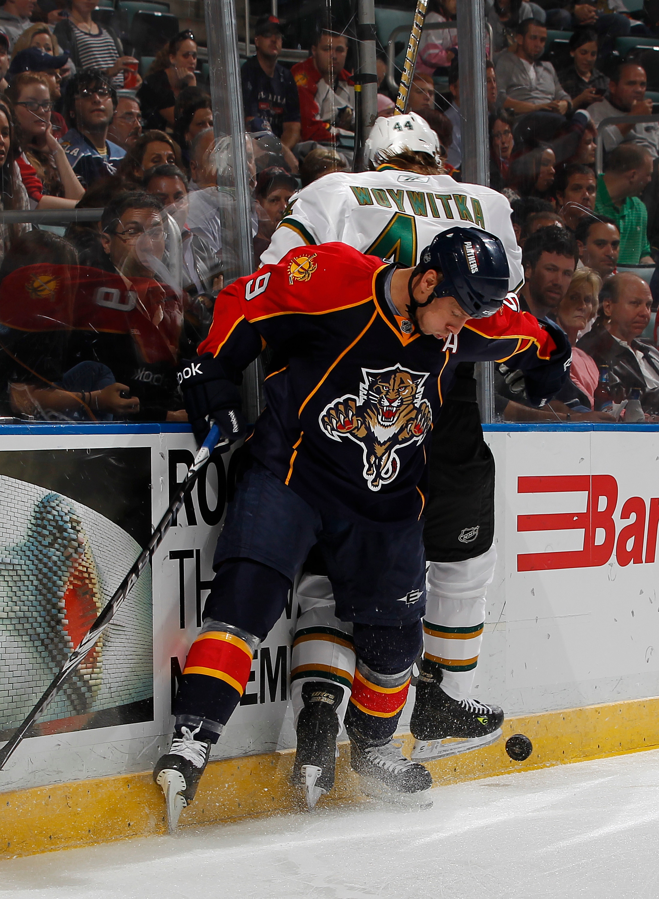 SUNRISE, FL - OCTOBER 21: Jeff Woywitka #44 of the Dallas Stars is checked off the puck by Stephen Weiss #9 of the Florida Panthers on October 21, 2010 at the BankAtlantic Center in Sunrise, Florida. The Stars defeated the Panthers 4-1. (Photo by Joel Aue
