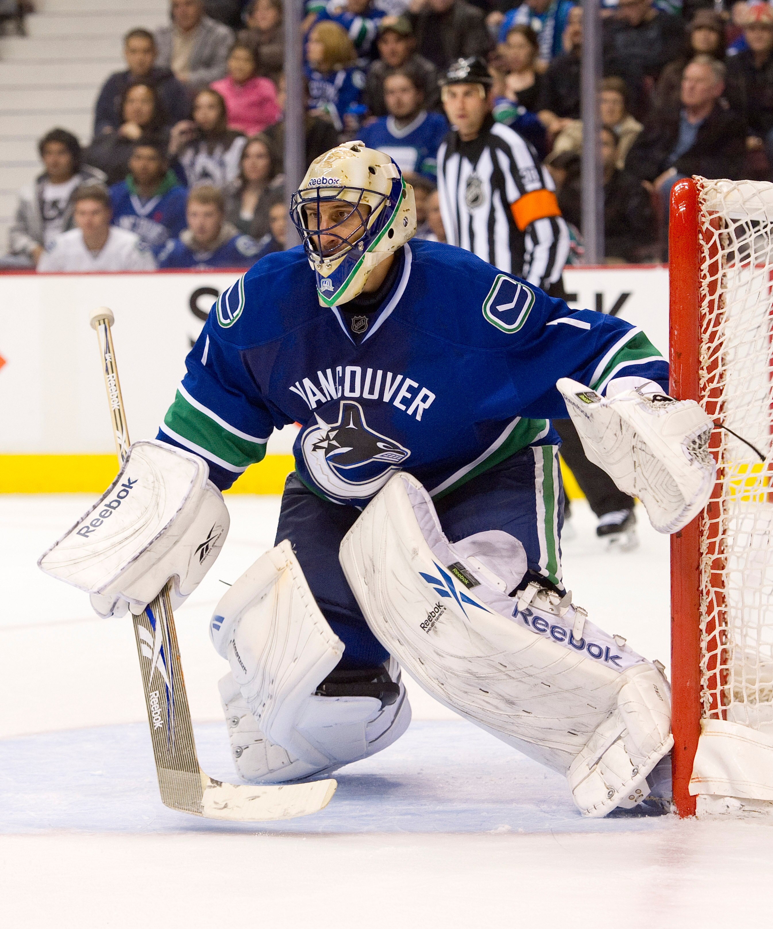 VANCOUVER, CANADA - NOVEMBER 1: Goalie Roberto Luongo #1 of the Vancouver Canucks gets into position to make a save during NHL action against the New Jersey Devils on November 01, 2010 at Rogers Arena in Vancouver, British Columbia, Canada.  (Photo by Ric