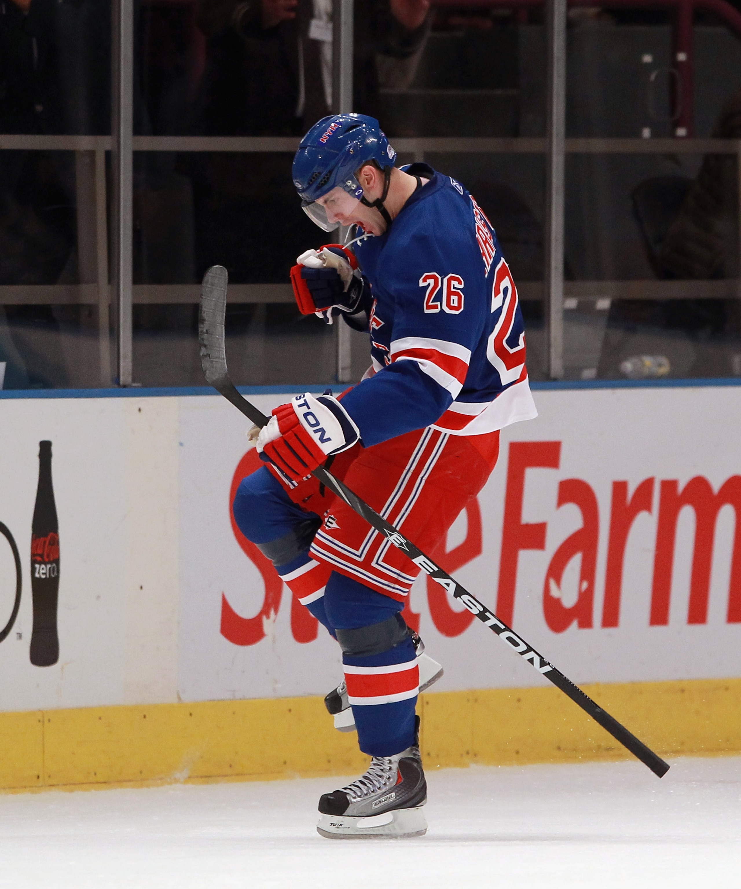NEW YORK - NOVEMBER 01: Erik Christensen #26 of the New York Rangers celebrates his game winning goal at 6:36 of the third period against the Chicago Blackhawks at Madison Square Garden on November 1, 2010 in New York City. The Rangers defeated the Blackh
