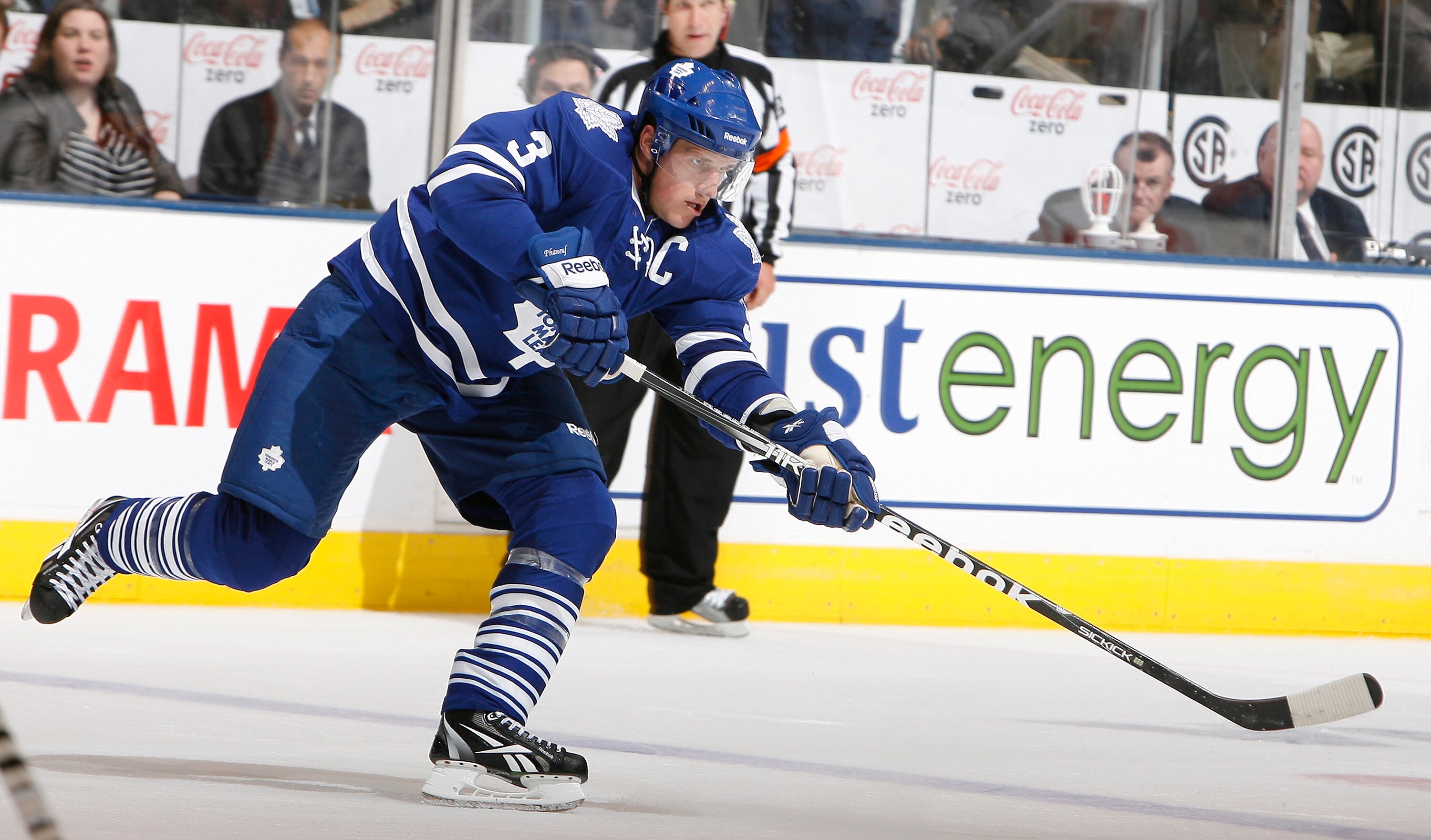 TORONTO - OCTOBER 26: Dion Phaneuf #3 of the Toronto Maple Leafs passes the puck against the Florida Panthers during game action at the Air Canada Centre October 26, 2010 in Toronto, Ontario, Canada. The Leafs won 3-1. (Photo by Abelimages/Getty Images)