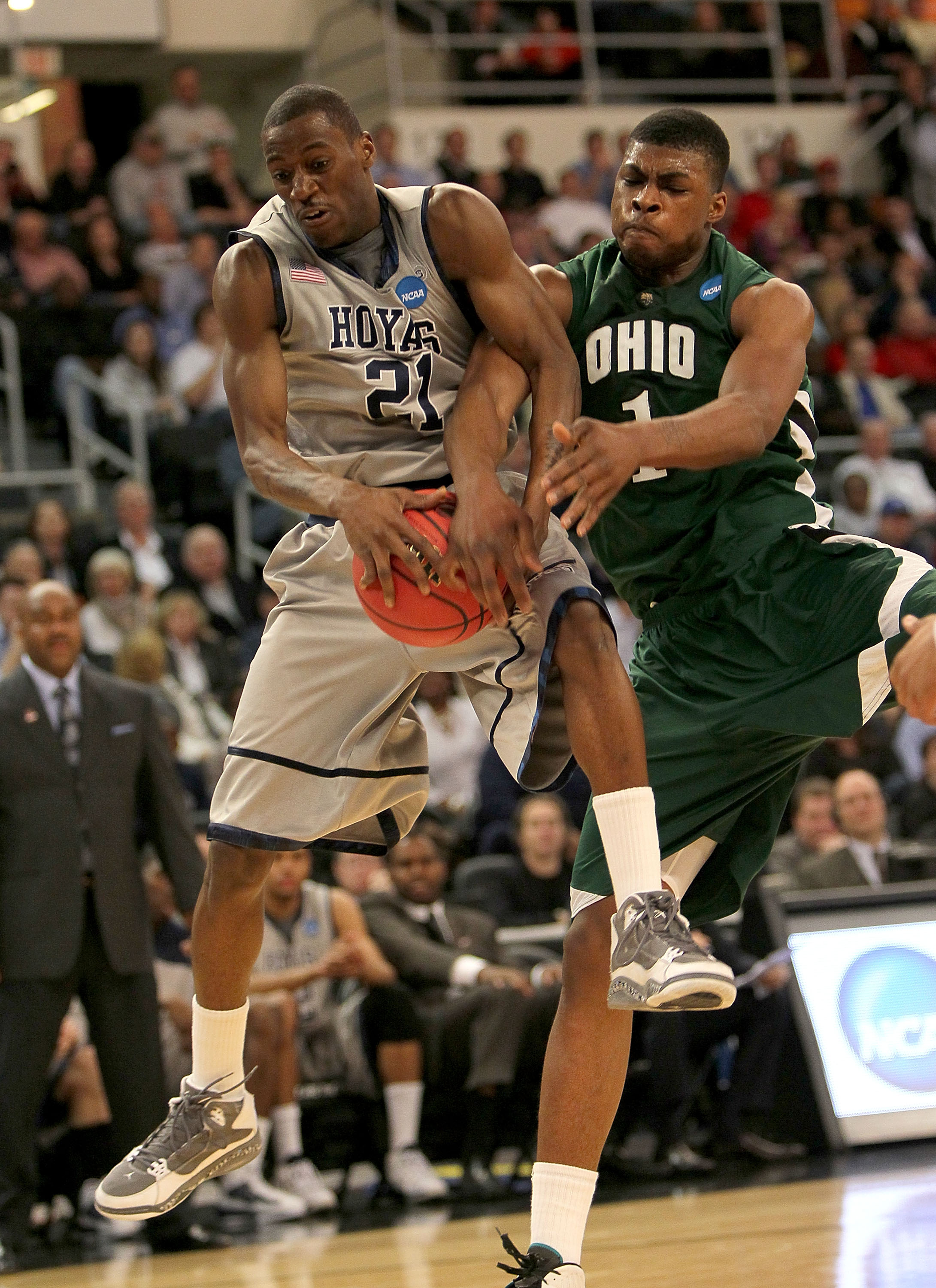 PROVIDENCE, RI - MARCH 18:  DeVaughn Washington #1 of the Ohio Bobcats presses Jason Clark #21 of the Georgetown Hoyas during the first round of the 2010 NCAA men's basketball tournament at Dunkin' Donuts Center on March 18, 2010 in Providence, Rhode Isla