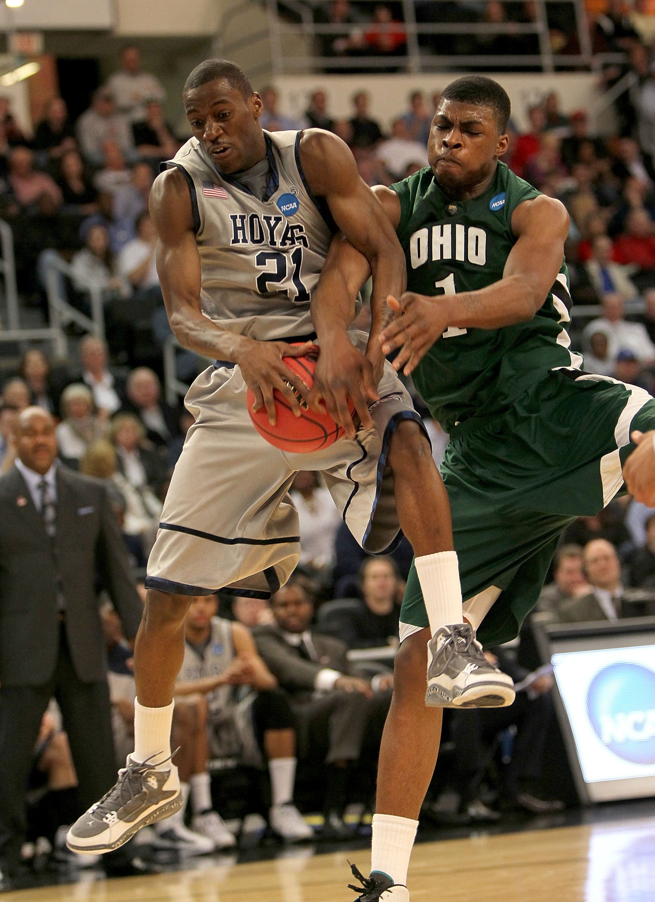 PROVIDENCE, RI - MARCH 18:  DeVaughn Washington #1 of the Ohio Bobcats presses Jason Clark #21 of the Georgetown Hoyas during the first round of the 2010 NCAA men's basketball tournament at Dunkin' Donuts Center on March 18, 2010 in Providence, Rhode Isla