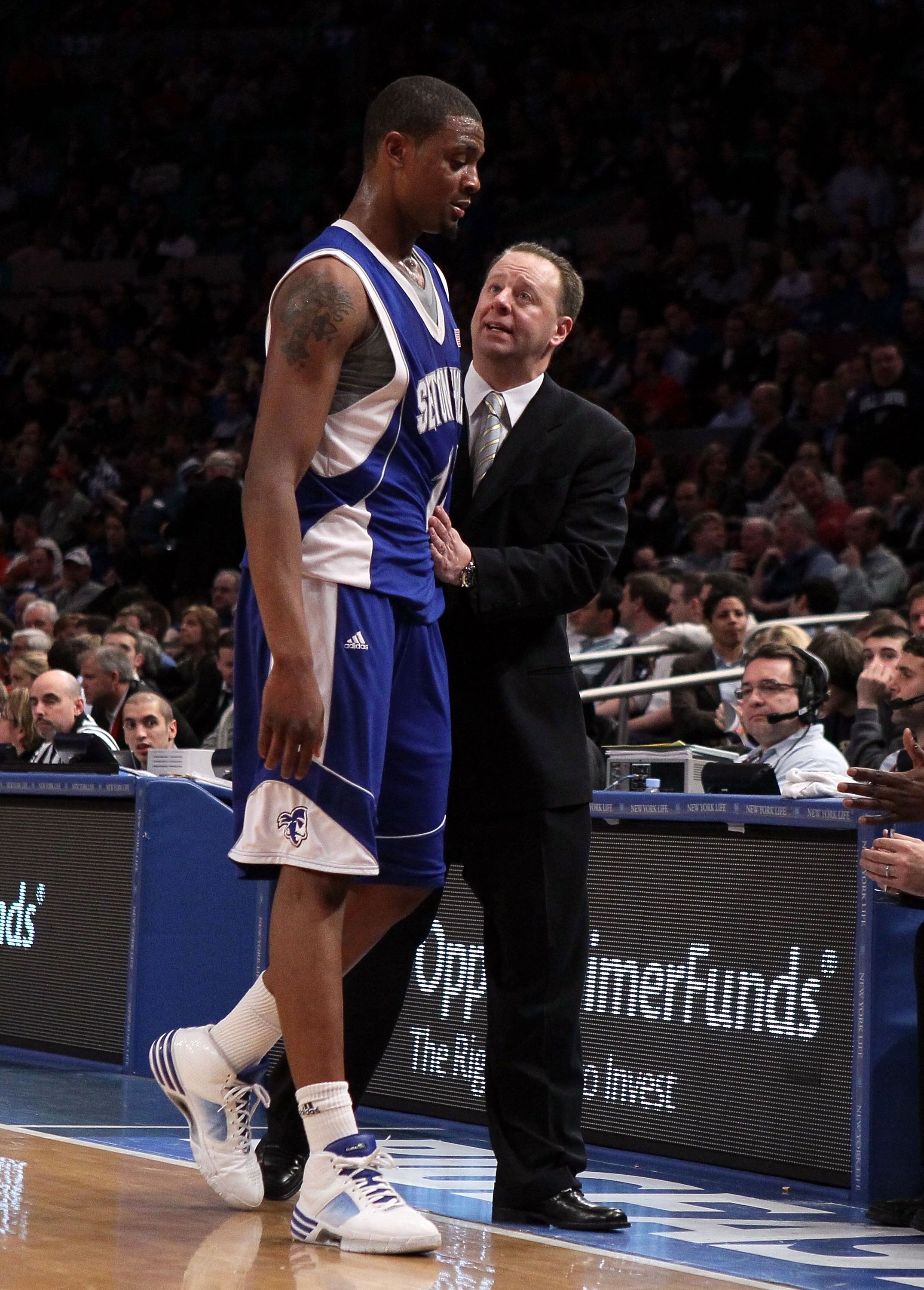 NEW YORK - MARCH 10:  Head coach Bobby Gonzalez reacts with Herb Pope #15 of the Seton Hall Pirates against the Notre Dame Fighting Irish during the second round of 2010 NCAA Big East Tournament at Madison Square Garden on March 10, 2010 in New York City.