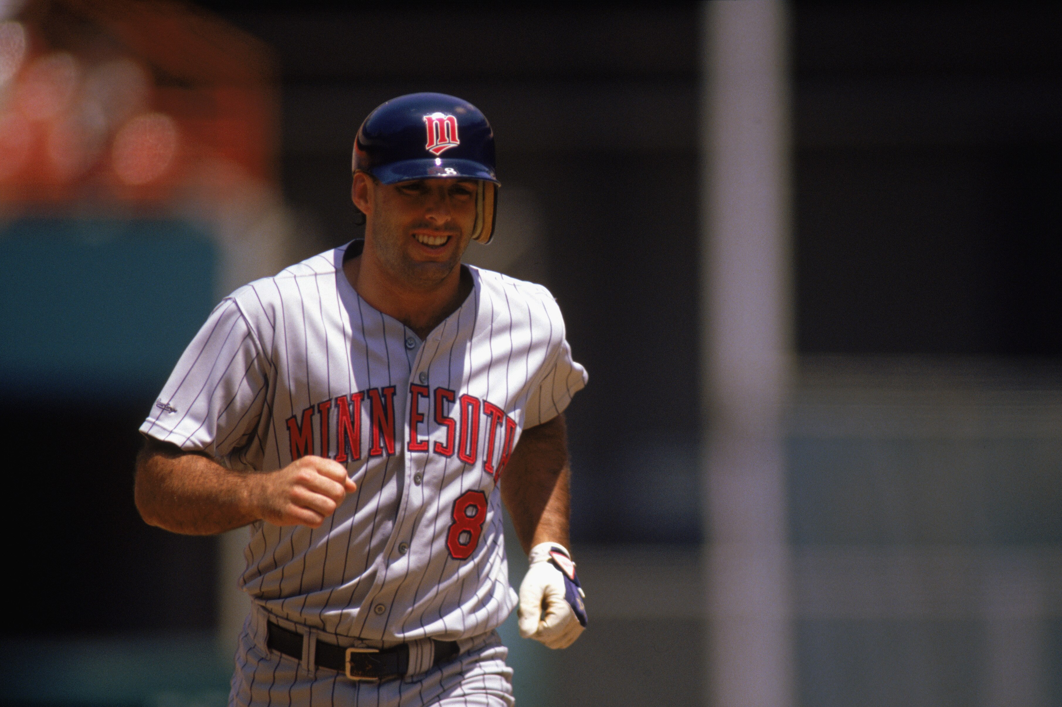 1989:  Gary Gaetti #8 of the Minnesota Twins runs the base after his home run during a game in the 1989 season.  (Photo by: Stephen Dunn/Getty Images)