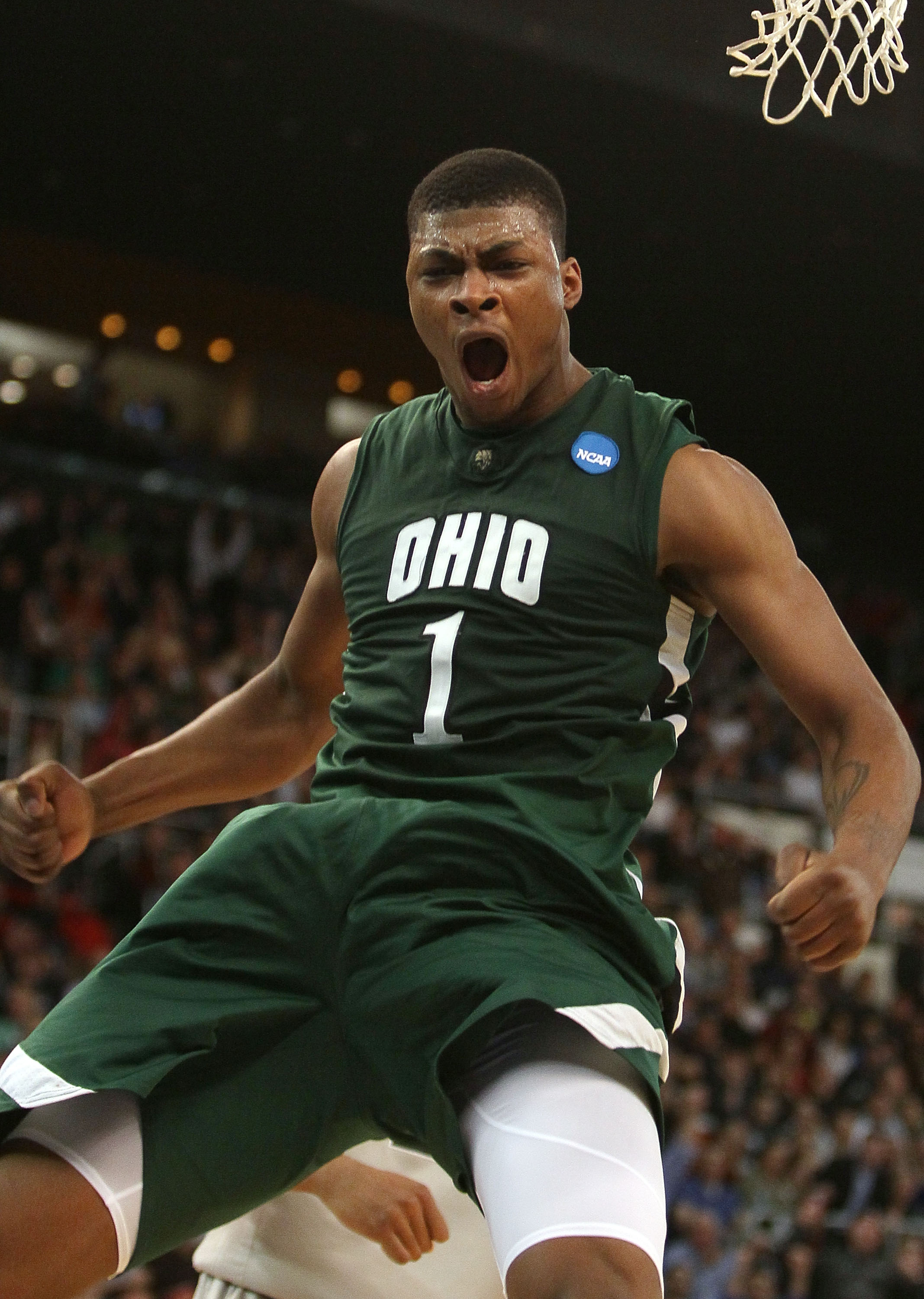 PROVIDENCE, RI - MARCH 18:  DeVaughn Washington #1 of the Ohio Bobcats celebrates his dunk in the second half against the Georgetown Hoyas during the first round of the 2010 NCAA men's basketball tournament on March 18, 2010 at the Dunkin Donuts Arena in