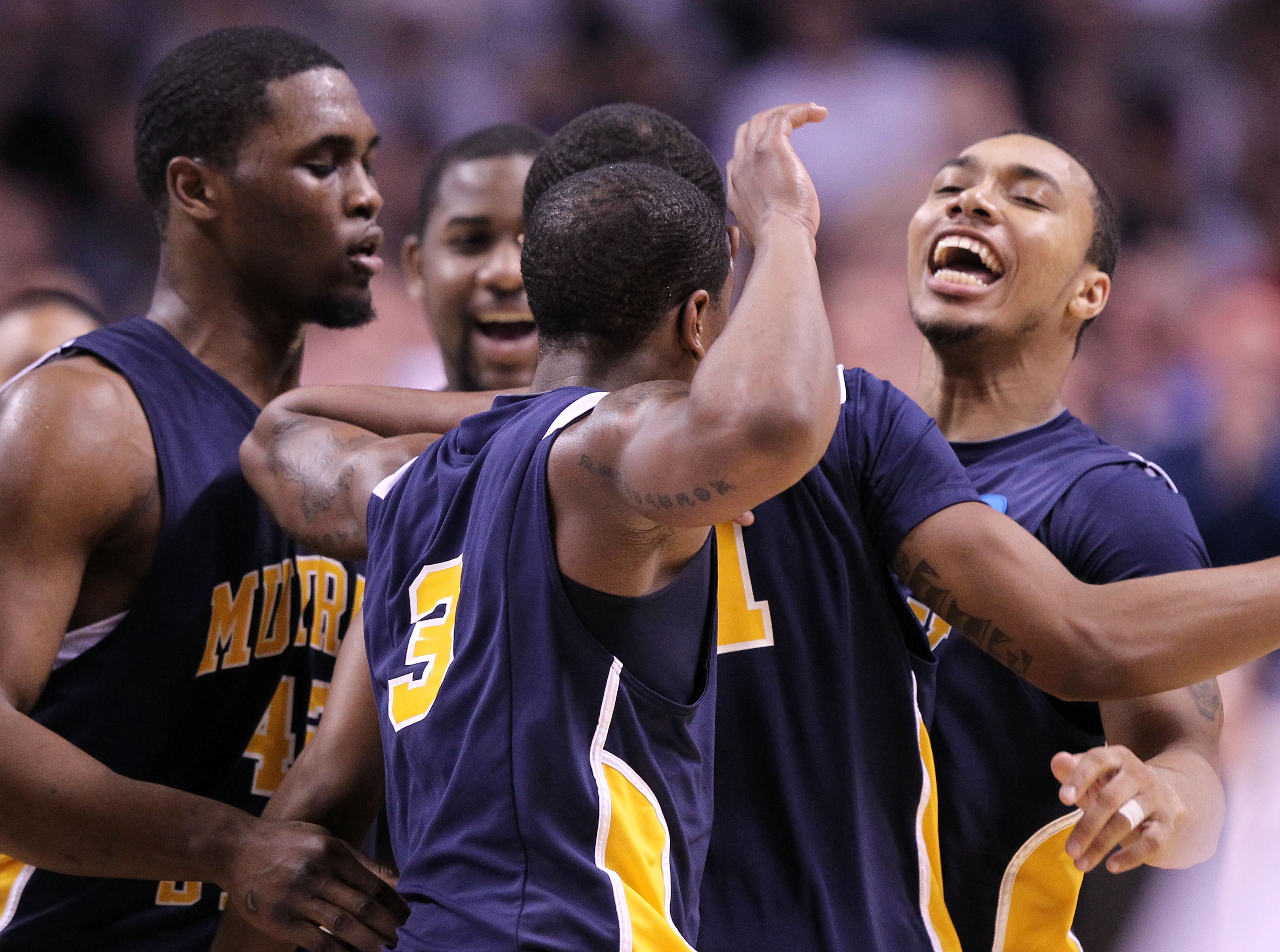 SAN JOSE, CA - MARCH 20: Guard B.J. Jenkins #1 of the Murray State Racers celebrates a three point basket by Isaiah Canaan #3 against the Butler Bulldogs at the end of the first half in the second round of the 2010 NCAA men's basketball tournament at HP SAN JOSE, CA - MARCH 20: Guard B.J. Jenkins #1 of the Murray State Racers celebrates a three point basket by Isaiah Canaan #3 against the Butler Bulldogs at the end of the first half in the second round of the 2010 NCAA men's basketball tournament at HP