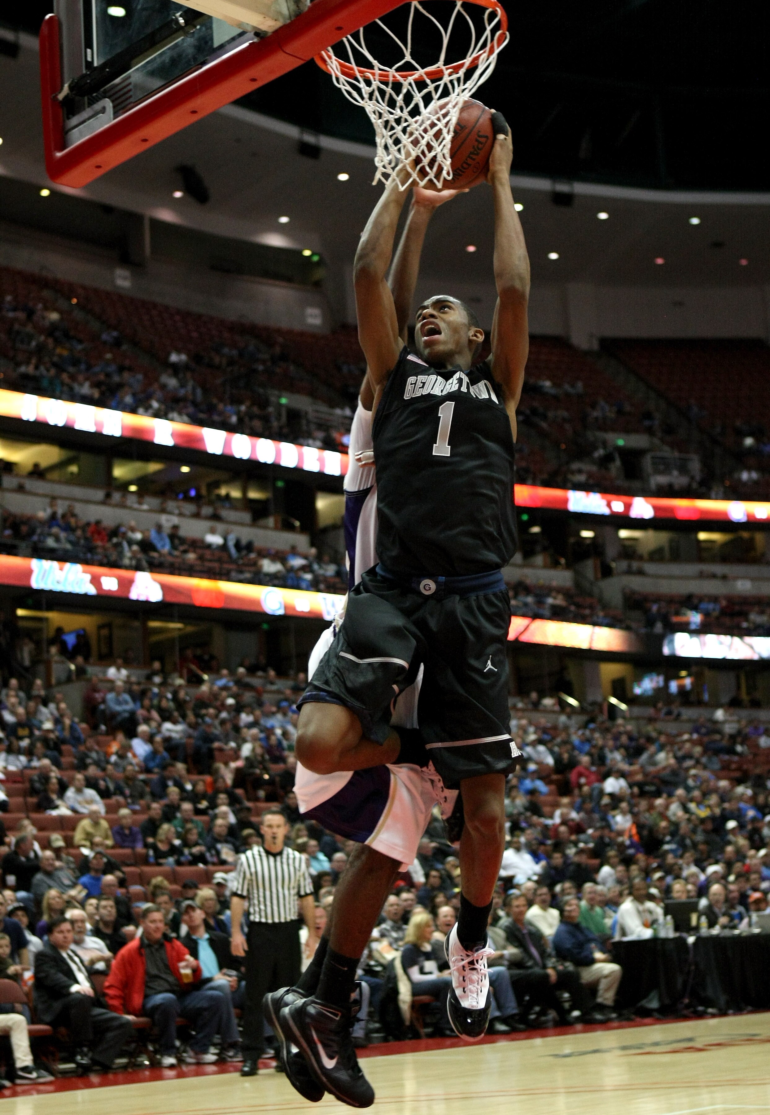 ANAHEIM, CA - DECEMBER 12: Hollis Thompson #1 of the Georgetown Hoyas goes up for a shot against the Washington Huskies in the John Wooden Classic on December 12, 2009 at the Honda Center in Anaheim, California. (Photo by Stephen Dunn/ Getty Images)