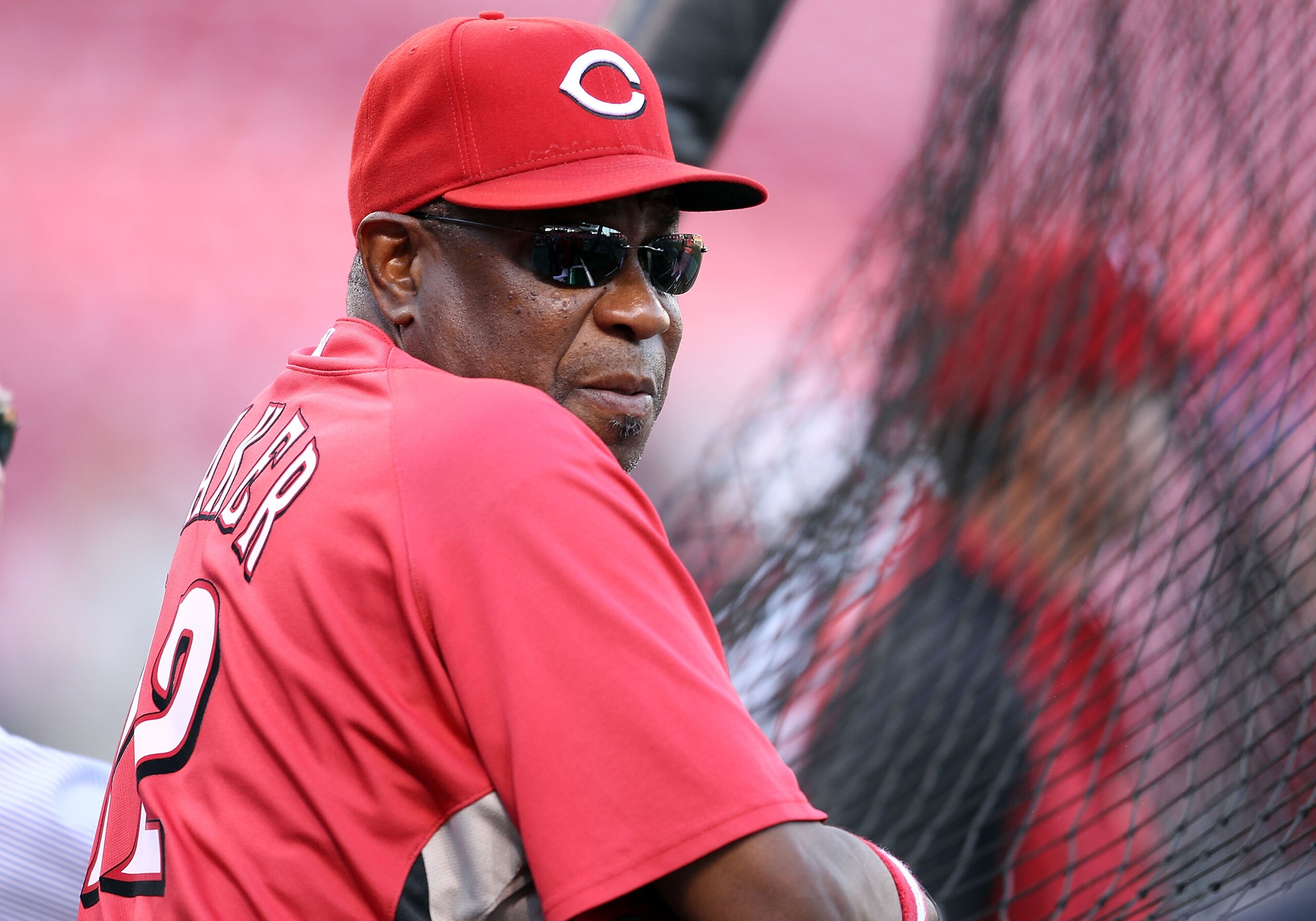 CINCINNATI - OCTOBER 10: Dusty Baker the Manager of the Cincinnati Reds takes in batting practice before the start of Game 3 of the NLDS against the Philadelphia Phillies at Great American Ball Park on October 10, 2010 in Cincinnati, Ohio. (Photo by A CINCINNATI - OCTOBER 10: Dusty Baker the Manager of the Cincinnati Reds takes in batting practice before the start of Game 3 of the NLDS against the Philadelphia Phillies at Great American Ball Park on October 10, 2010 in Cincinnati, Ohio. (Photo by A