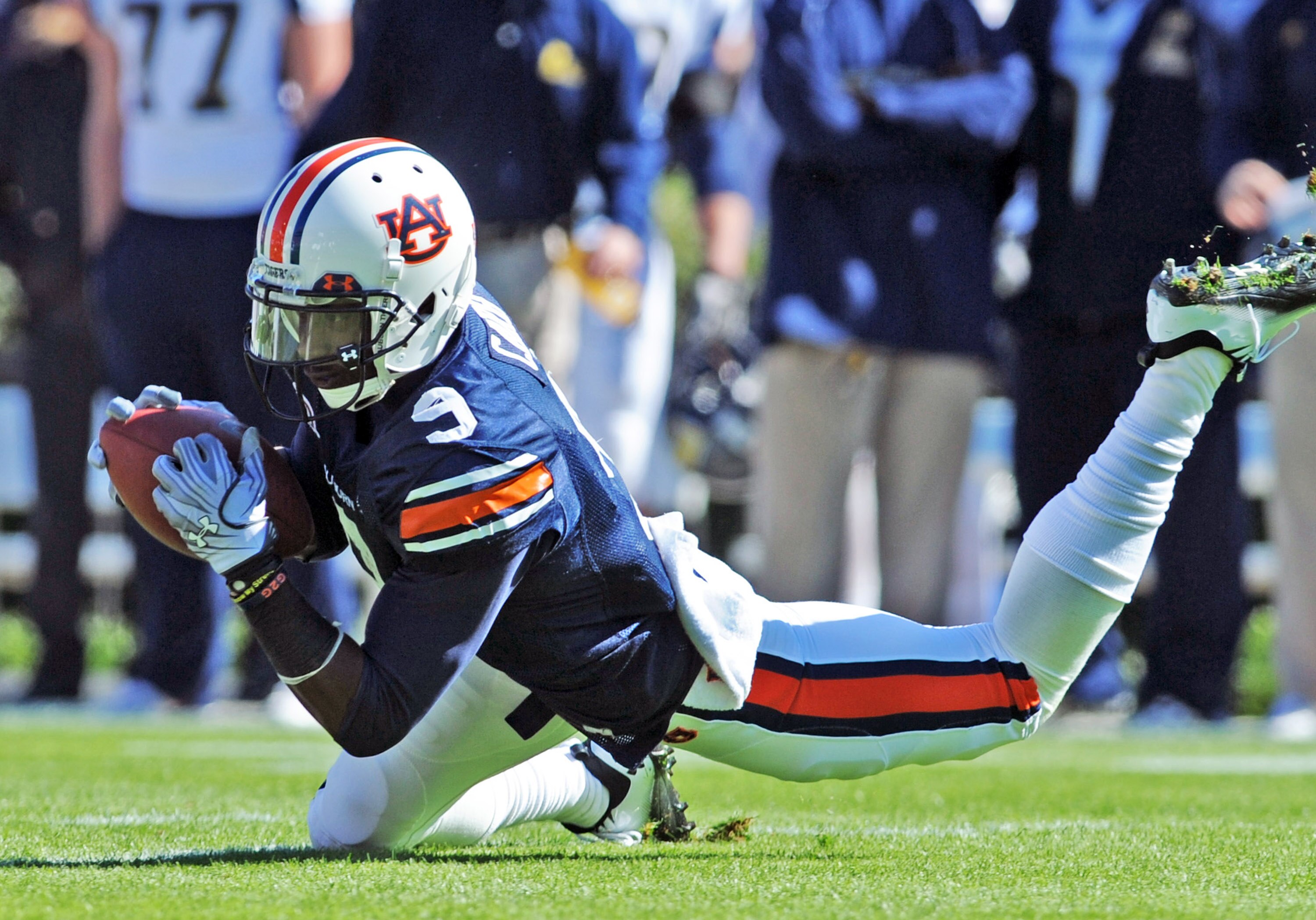 AUBURN, AL - NOVEMBER 6:  Wide receiver Quindarius Carr #9 of the Auburn Tigers dives to recover a muffed punt against the Chattanooga Mocs November 6, 2010 at Jordan-Hare Stadium in Auburn, Alabama.  (Photo by Al Messerschmidt/Getty Images)