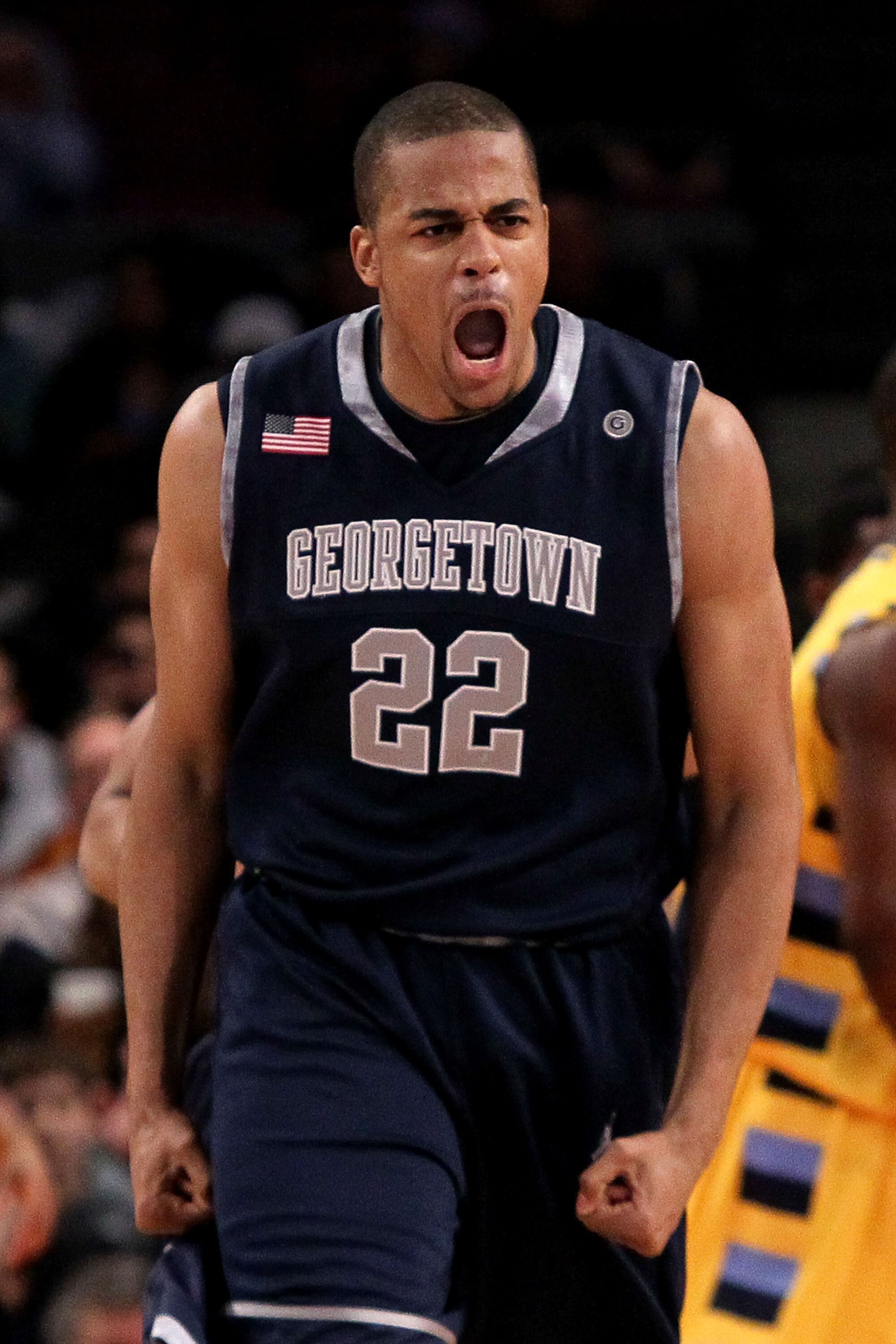 NEW YORK - MARCH 12:  Julian Vaughn #22 of the Georgetown Hoyas reacts after a play against the Marquette Golden Eagles during the semifinal of the 2010 Big East Tournament at Madison Square Garden on March 12, 2010 in New York City.  (Photo by Jim McIsaa