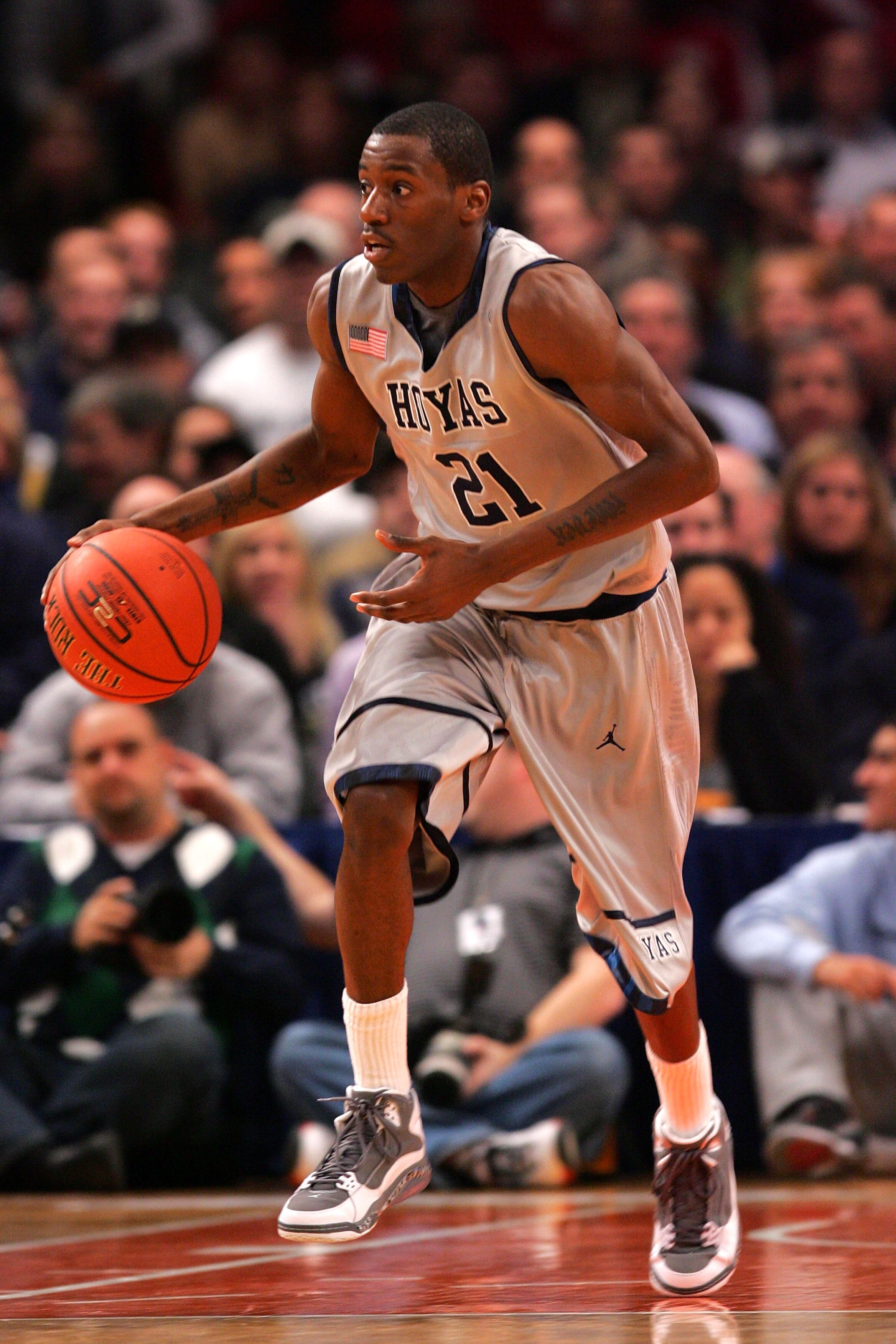 NEW YORK - DECEMBER 08: Jason Clark #21 of the Georgetown Hoyas dribbles the ball against the Butler Bulldogs during the Jimmy V Classic at Madison Square Garden on December 8, 2009 in New York, New York. The Hoyas defeated the Bulldogs 72-65.  (Photo by