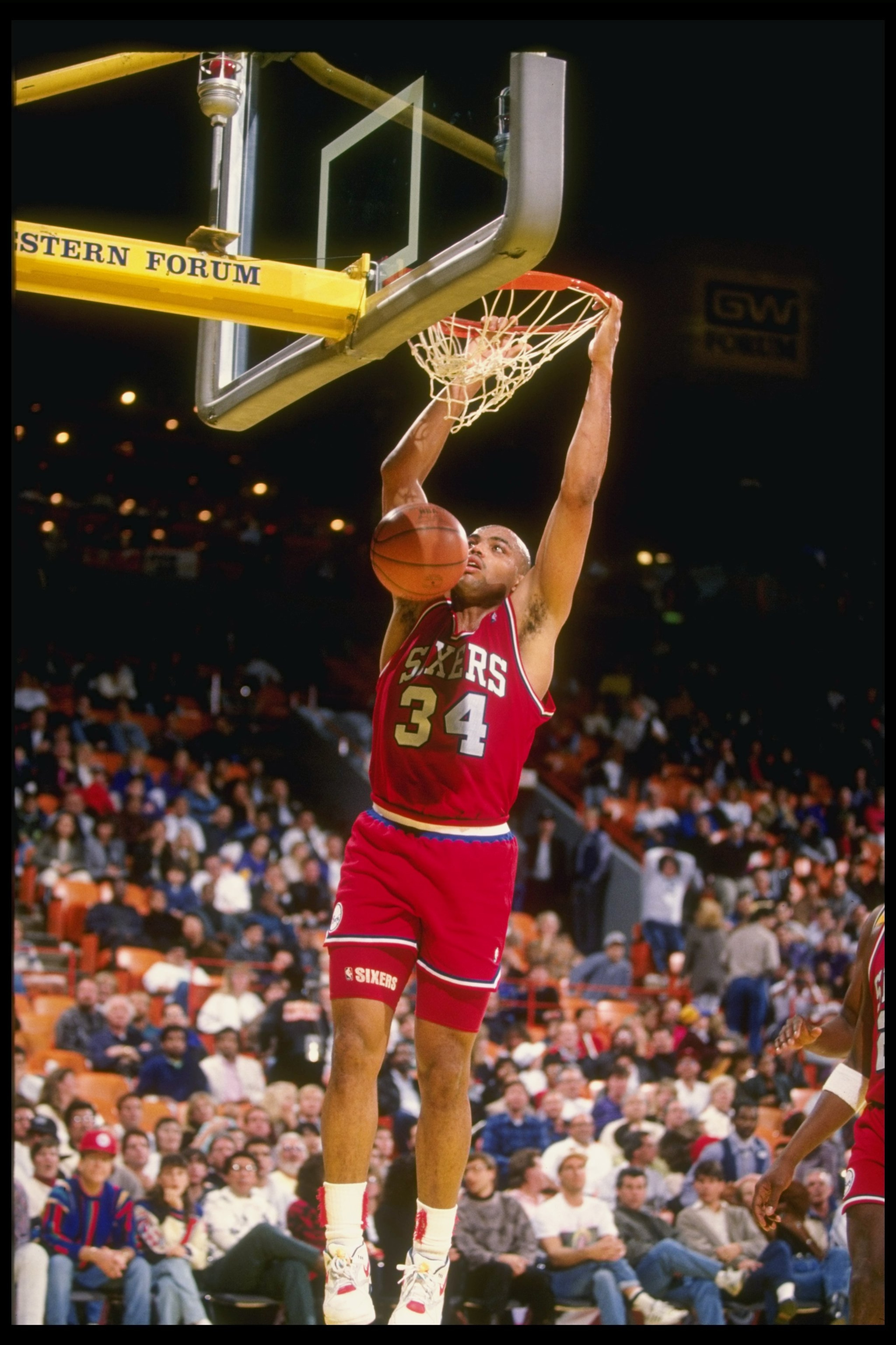 30 Dec 1990: Forward Charles Barkley of the Philadelphia 76ers slam dunks during a game against the Los Angeles Lakers at the Great Western Forum in Inglewood, California. 30 Dec 1990: Forward Charles Barkley of the Philadelphia 76ers slam dunks during a game against the Los Angeles Lakers at the Great Western Forum in Inglewood, California.