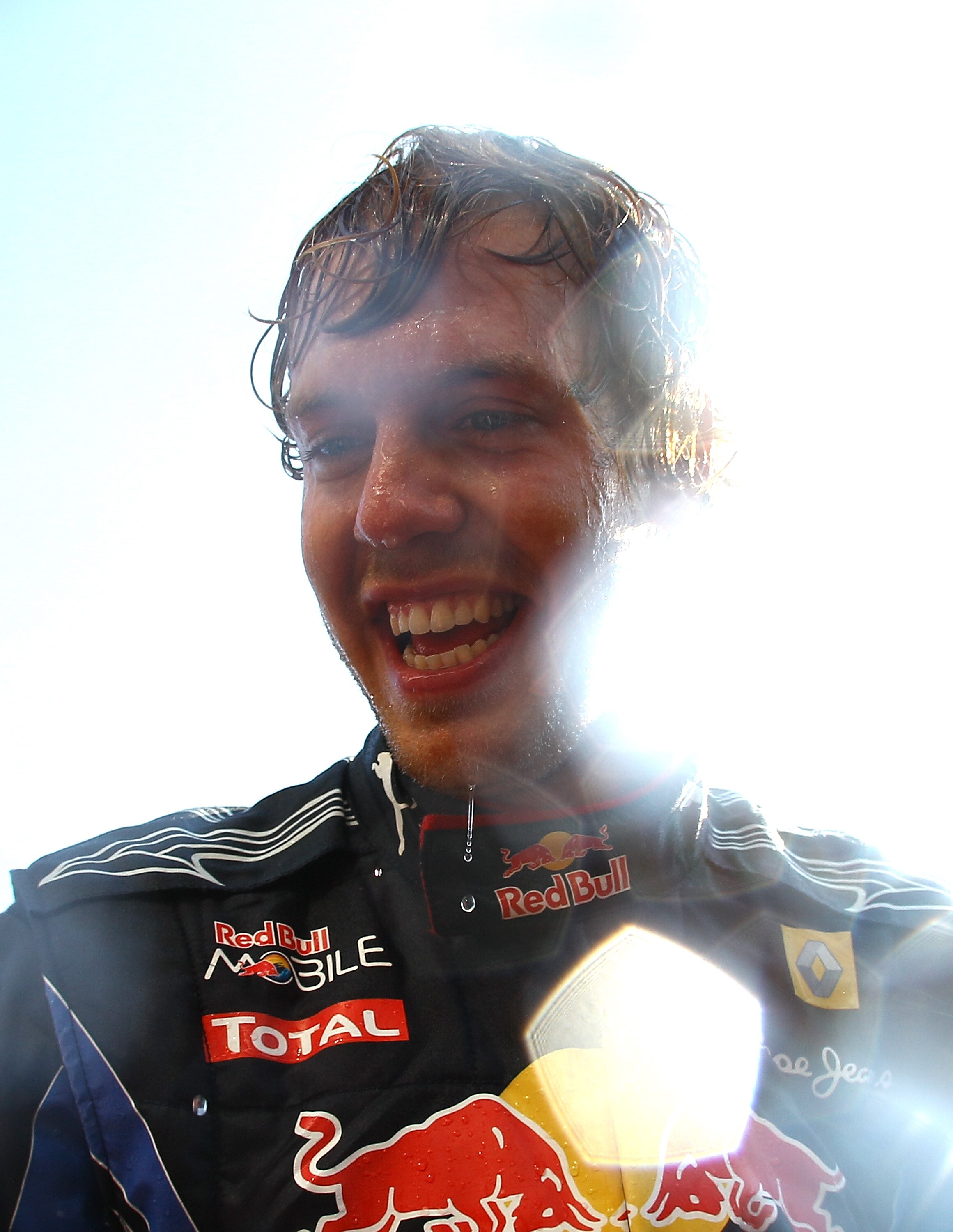 SAO PAULO, BRAZIL - NOVEMBER 07:  Sebastian Vettel of Germany and Red Bull Racing celebrates with his team after winning the Brazilian Formula One Grand Prix at the Interlagos Circuit on November 7, 2010 in Sao Paulo, Brazil.  (Photo by Vladimir Rys/Getty