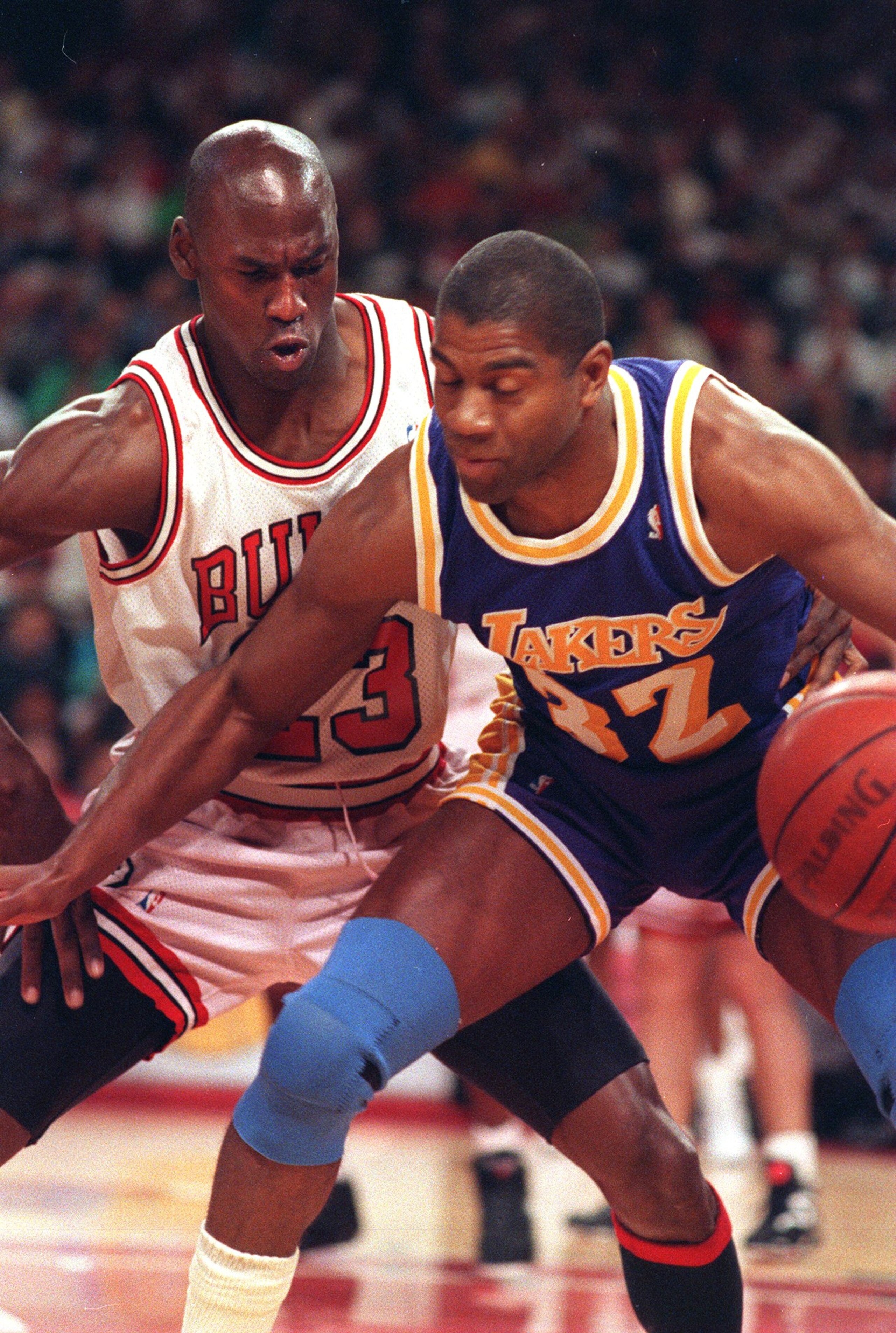 5 Jun 1991: Magic Johnson of the Los Angeles Lakers shields the ball from Michael Jordan of the Chicago Bulls during game two of the 1991 NBA finals. Mandatory Credit: Jonathan Daniel/ALLSPORT 5 Jun 1991: Magic Johnson of the Los Angeles Lakers shields the ball from Michael Jordan of the Chicago Bulls during game two of the 1991 NBA finals. Mandatory Credit: Jonathan Daniel/ALLSPORT