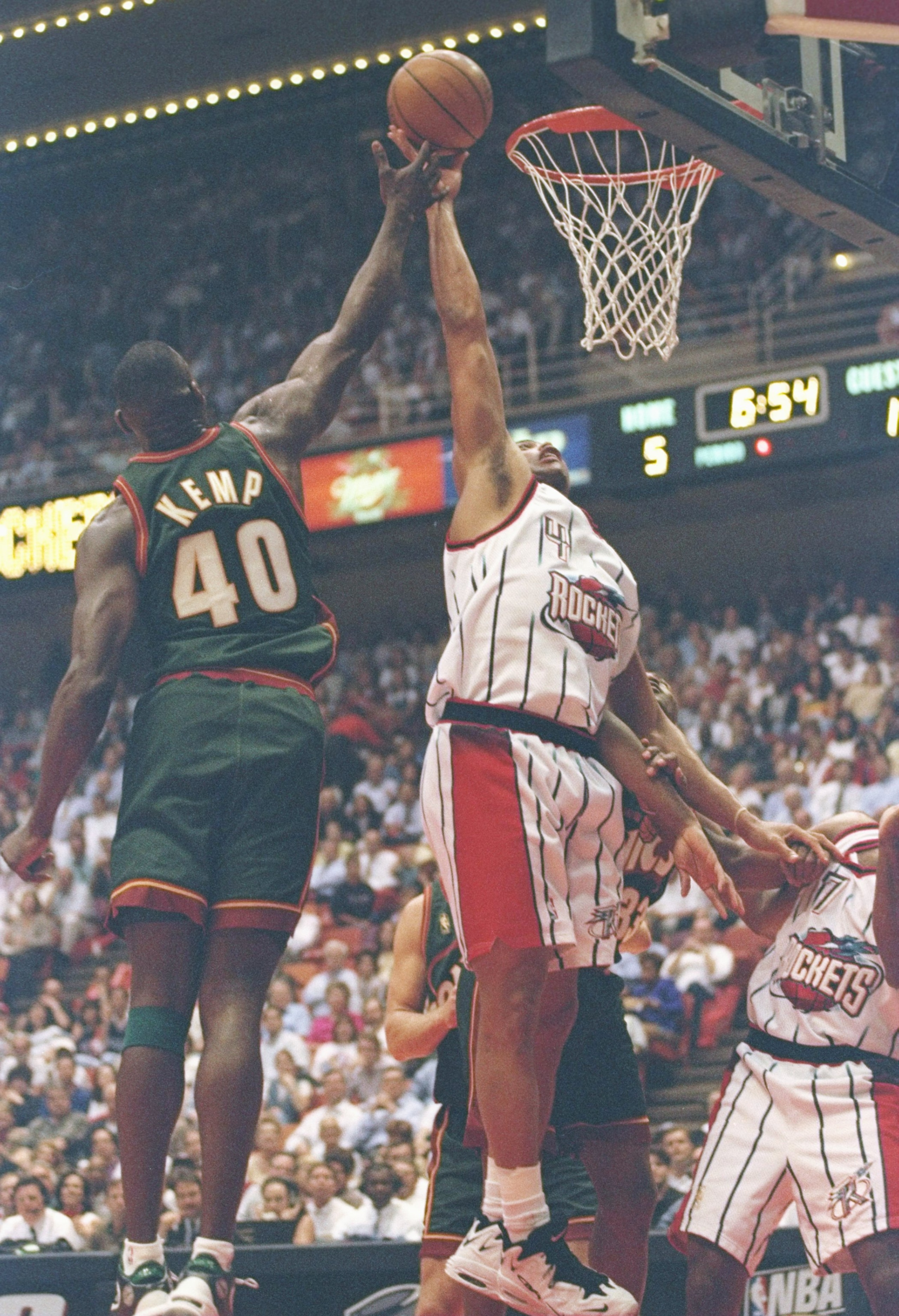 13 May 1997: Forward Charles Barkley of the Houston Rockets and Shawn Kemp of the Seattle Supersonics jump for the ball during a playoff game at the Summit in Houston, Texas. The Supersonics won the game 100-94. Mandatory Credit: Stephen Dunn /Allsport 13 May 1997: Forward Charles Barkley of the Houston Rockets and Shawn Kemp of the Seattle Supersonics jump for the ball during a playoff game at the Summit in Houston, Texas. The Supersonics won the game 100-94. Mandatory Credit: Stephen Dunn /Allsport