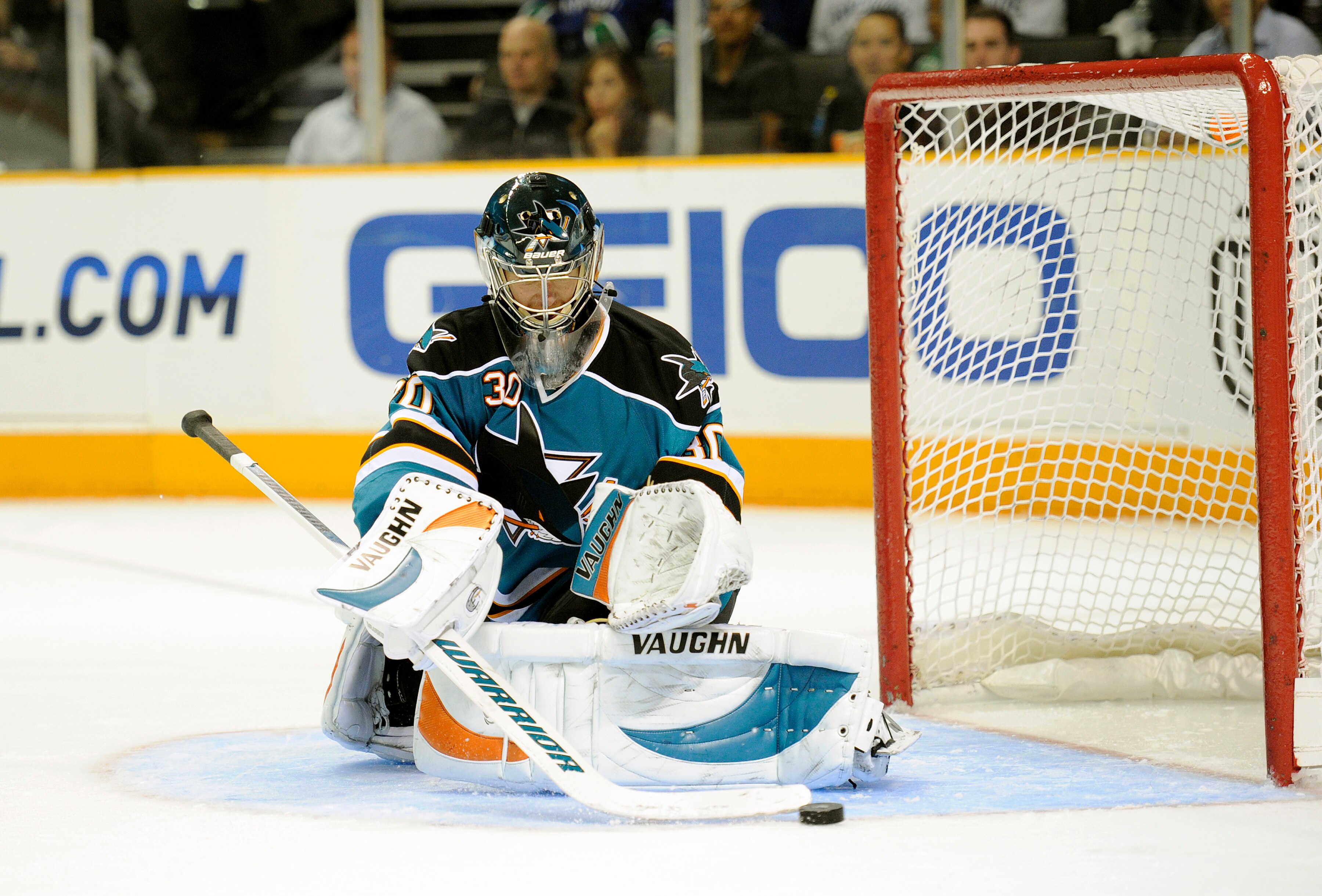 SAN JOSE, CA - SEPTEMBER 29: Goalie Antero Niittymaki #30 blocks a shot on goal against the Vancouver Canucks during their preseason game on September 29, 2010 at the HP Pavilion in San Jose, California. The Sharks won the game 6-2. (Photo by Thearon W. H