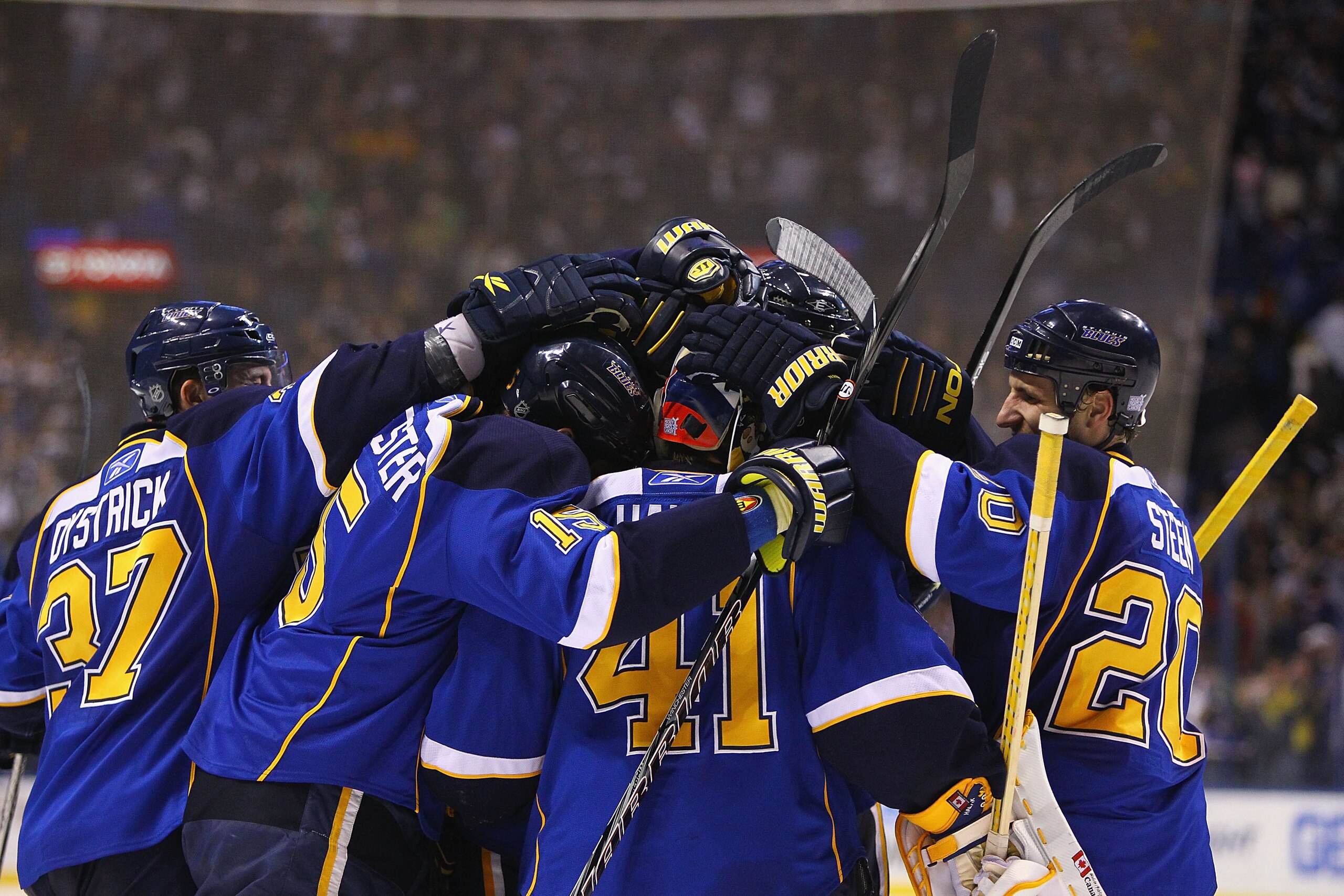 ST. LOUIS - OCTOBER 30: Jaroslav Halak #41 of the St. Louis Blues is congratulated by his teammates after beating the Atlanta Thrashers at the Scottrade Center on October 30, 2010 in St. Louis, Missouri.  The Blues beat the Thrashers 4-3 in a shootout.  (