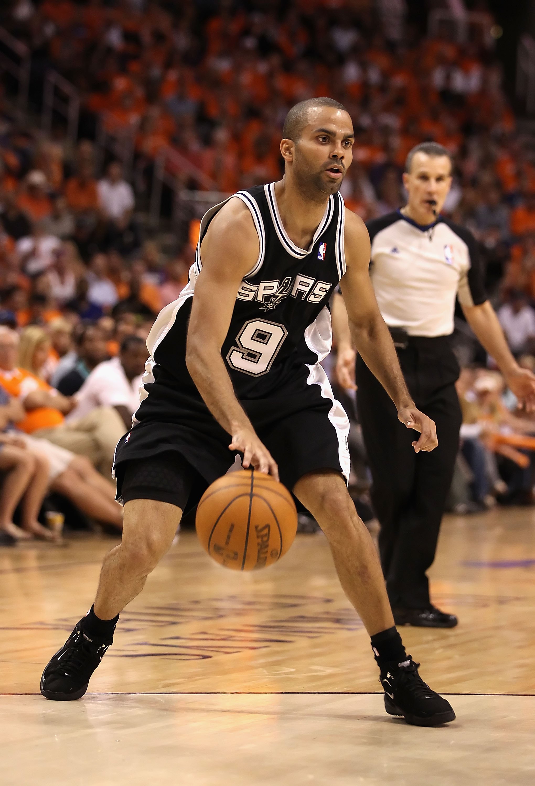 PHOENIX - MAY 03: Tony Parker #9 of the San Antonio Spurs in action during Game One of the Western Conference Semifinals of the 2010 NBA Playoffs against the Phoenix Suns at US Airways Center on May 3, 2010 in Phoenix, Arizona. The Suns defeated the Spu PHOENIX - MAY 03: Tony Parker #9 of the San Antonio Spurs in action during Game One of the Western Conference Semifinals of the 2010 NBA Playoffs against the Phoenix Suns at US Airways Center on May 3, 2010 in Phoenix, Arizona. The Suns defeated the Spu
