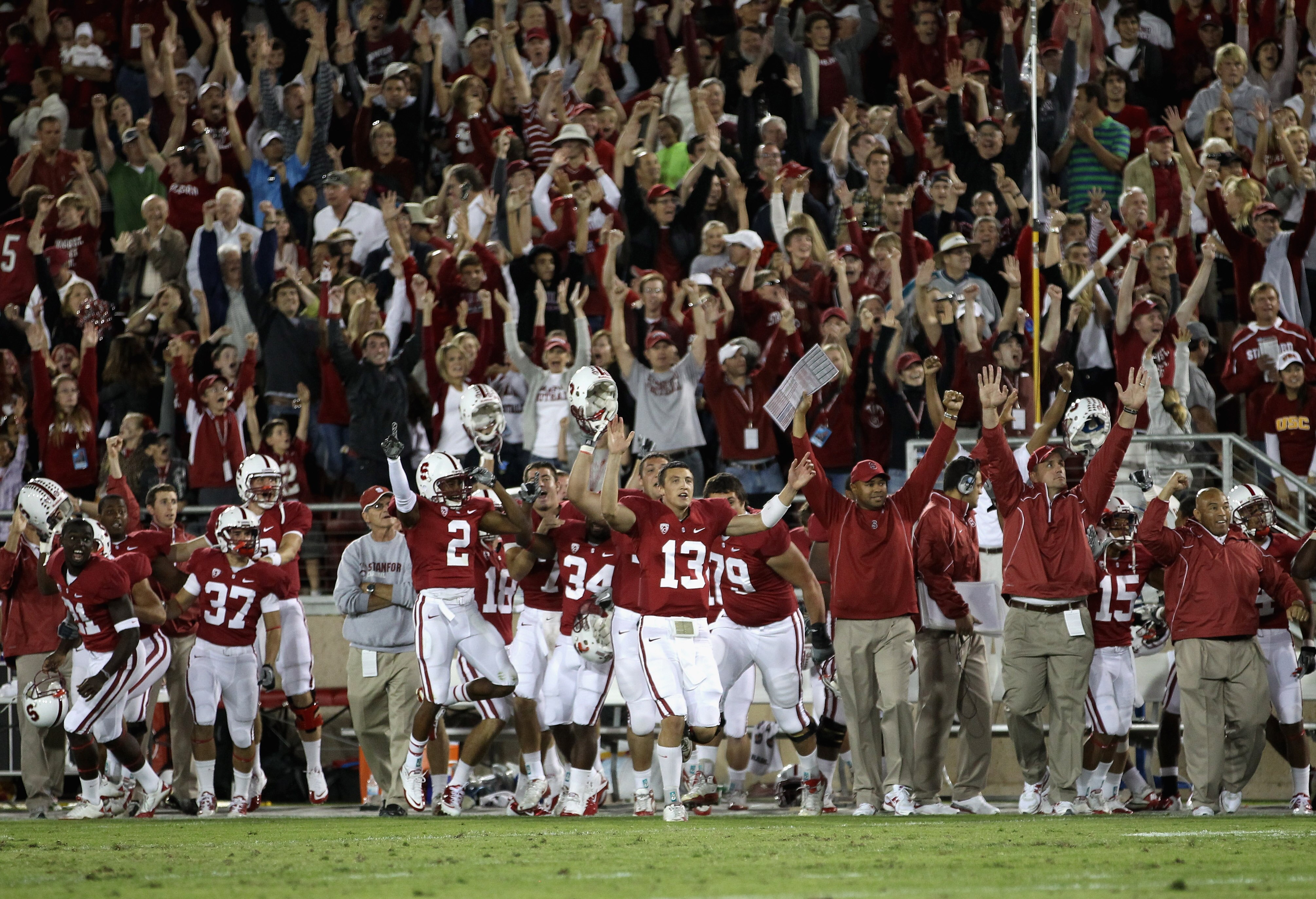 PALO ALTO, CA - OCTOBER 09:  The Stanford Cardinal sideline celebrates after Nate Whitaker kicked a field goal with to beat the USC Trojans 37-35 at Stanford Stadium on October 9, 2010 in Palo Alto, California.  (Photo by Ezra Shaw/Getty Images)