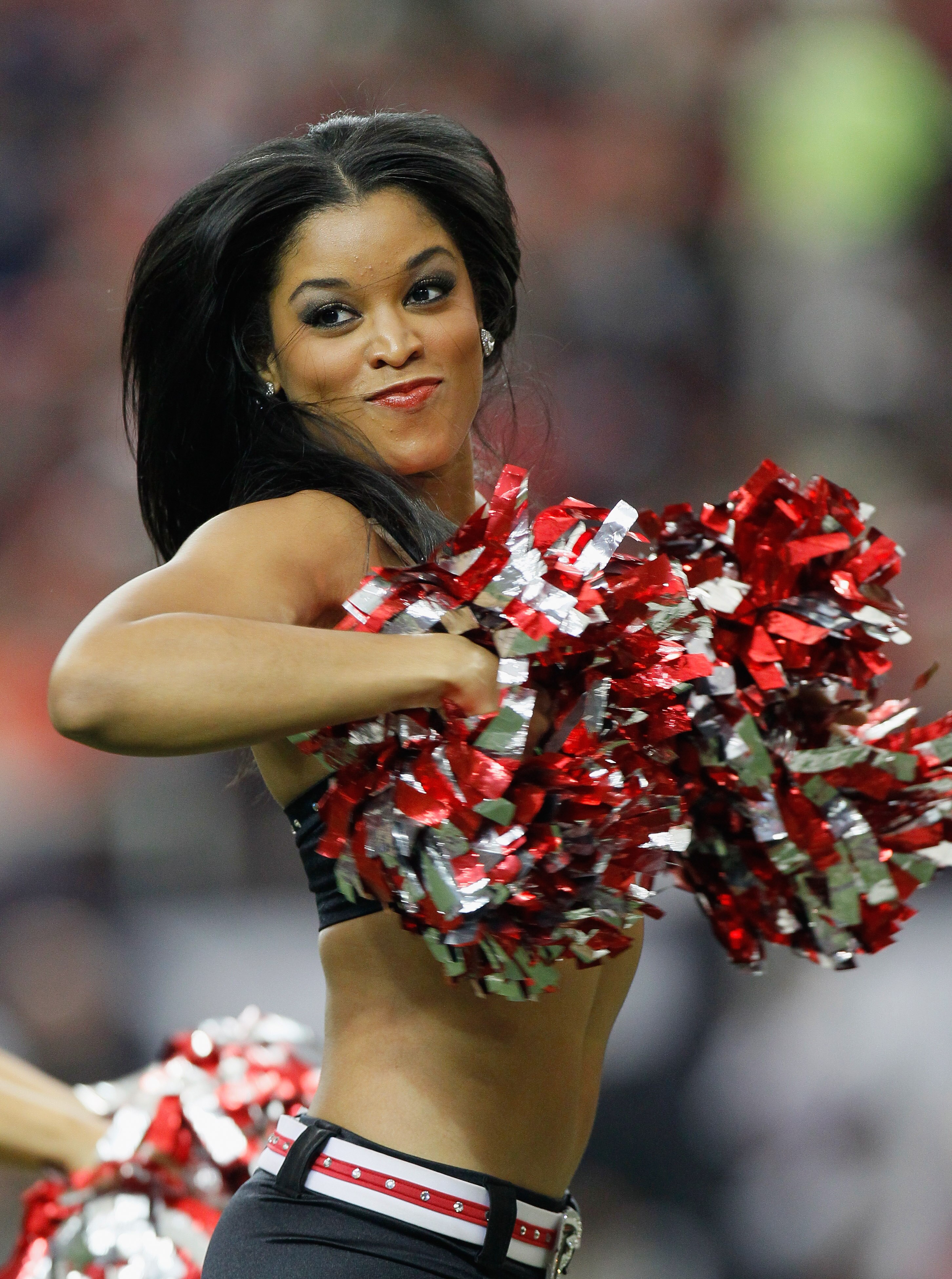 ATLANTA - NOVEMBER 07:  An Atlanta Falcons cheerleader performs during the game against the Tampa Bay Buccaneers at Georgia Dome on November 7, 2010 in Atlanta, Georgia.  (Photo by Kevin C. Cox/Getty Images)