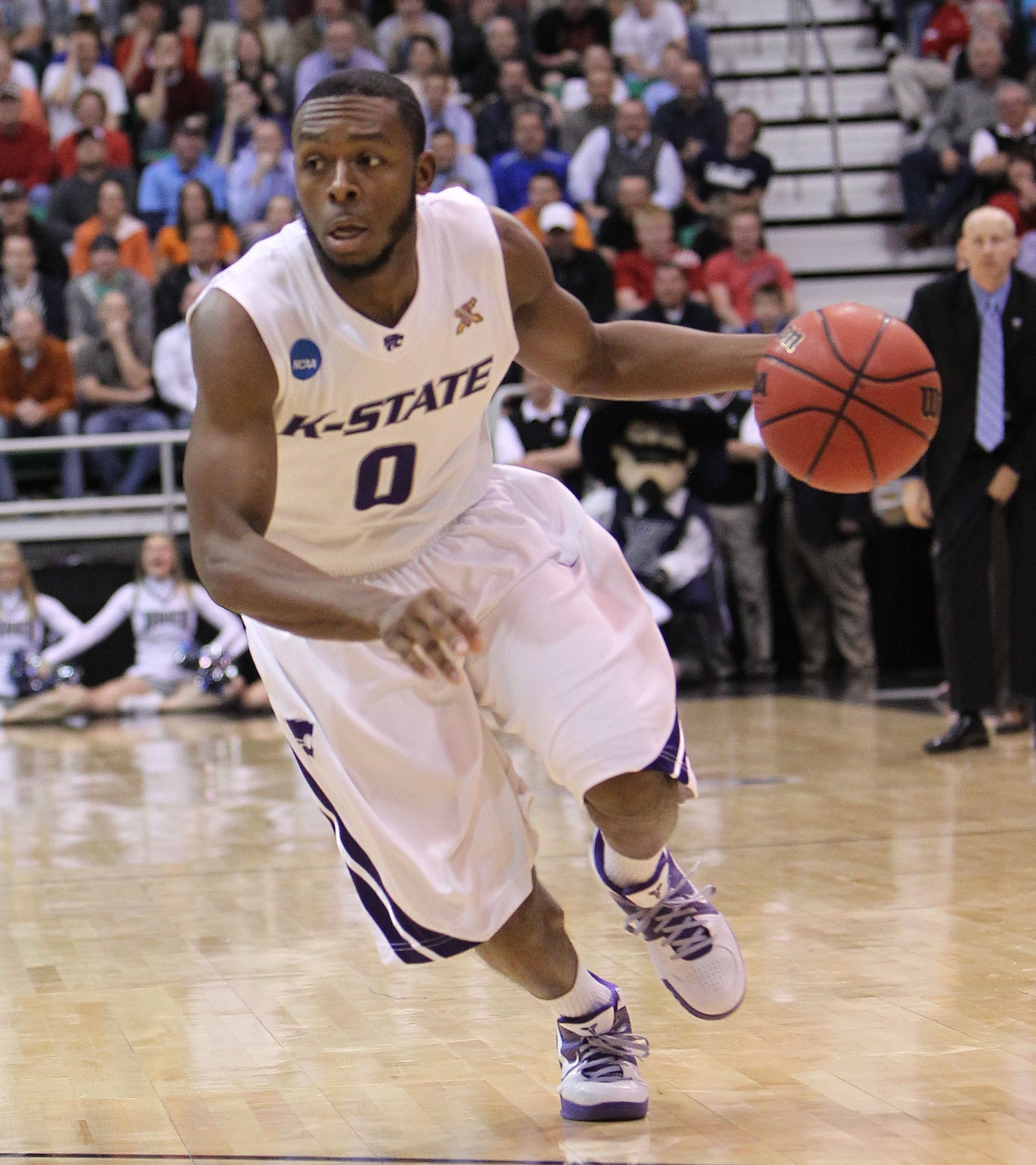 SALT LAKE CITY - MARCH 25:  Jacob Pullen #0 of the Kansas State Wildcats in action against the Xavier Musketeers during the third round of the 2010 NCAA men's basketball tournament at the Energy Solutions Arena on March 25, 2010 in Salt Lake City, Utah.