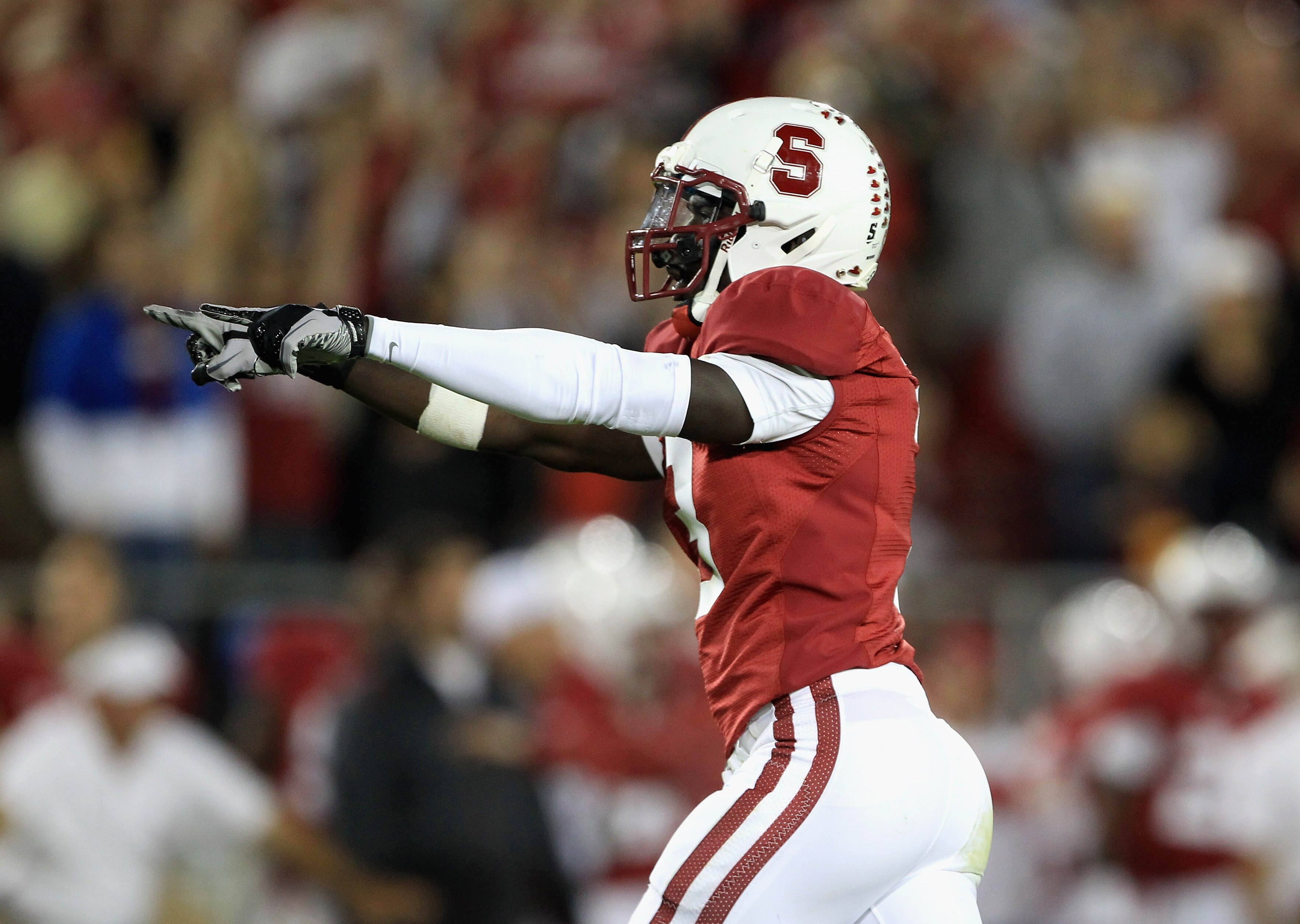 PALO ALTO, CA - OCTOBER 09:  Michael Thomas #3 of the Stanford Cardinal celebrates after the USC Trojans turned the ball over on downs in the fourth quarter at Stanford Stadium on October 9, 2010 in Palo Alto, California.  (Photo by Ezra Shaw/Getty Images