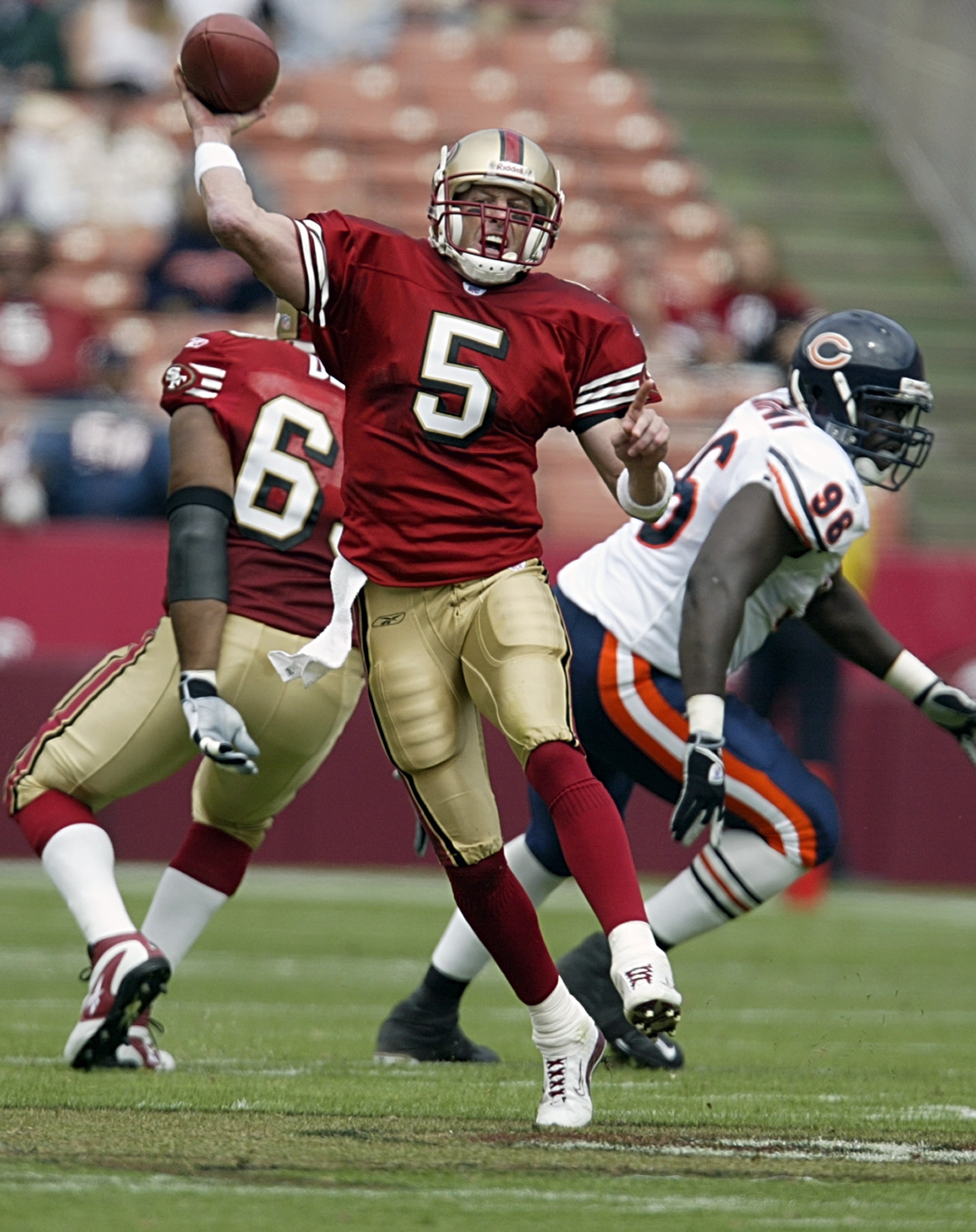 SAN FRANCISCO - SEPTEMBER 7:  Jeff Garcia #5 of the San Francisco 49ers throws the ball against the Chicago Bears on September 7, 2003 at Candelstick Park in San Francisco, California.n The 49ers defeated the Bears 49-7. (Photo by Jed Jacobsohn/Getty Imag