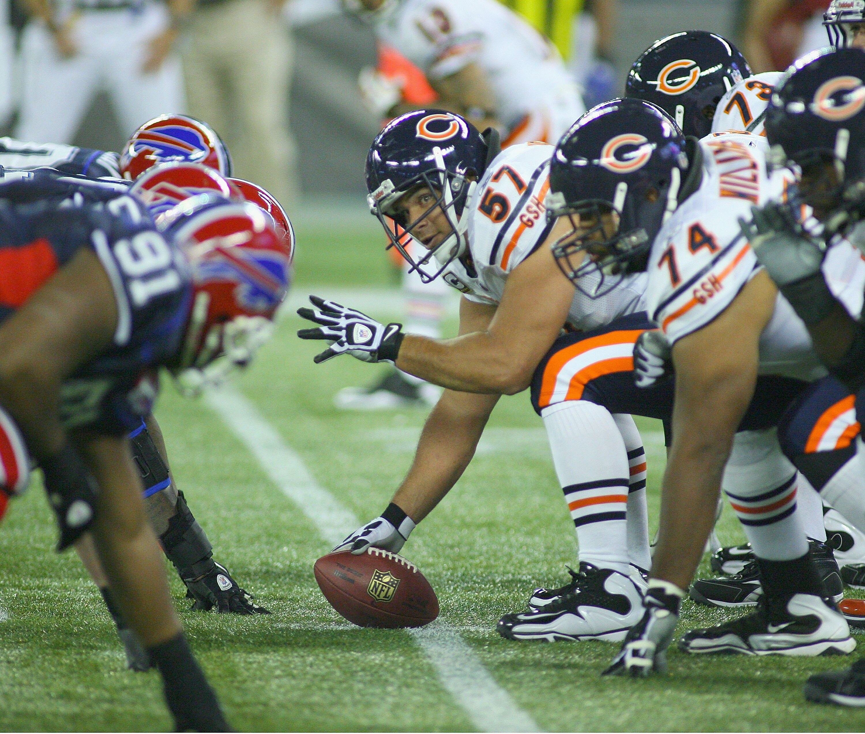 TORONTO, ON - NOVEMBER 07: Olin Kreutz #57  of the Chicago Bears get ready to snap the ball against the Buffalo Bills  at Rogers Centre on November 7, 2010 in Toronto, Canada.  (Photo by Rick Stewart/Getty Images)