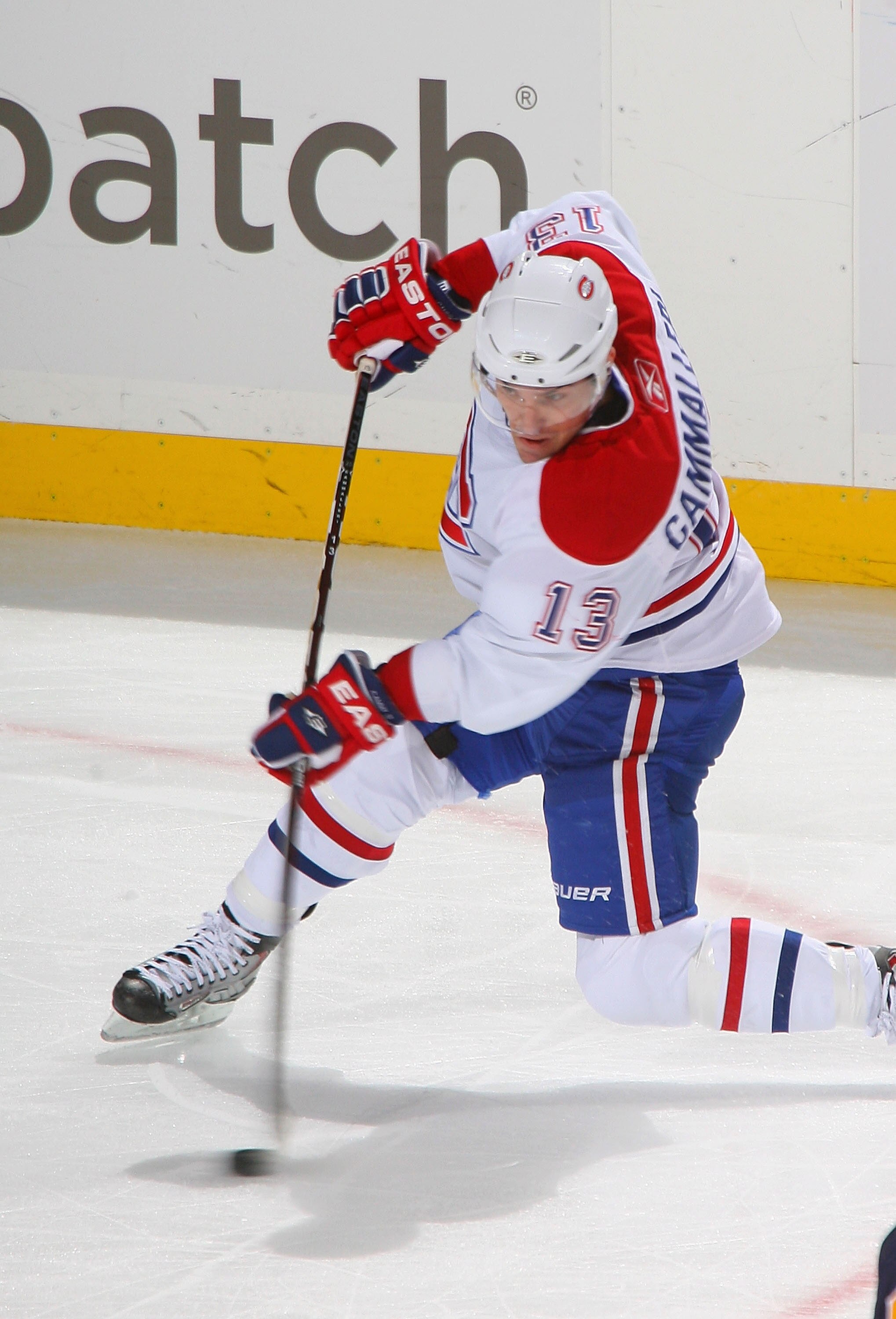 BUFFALO, NY - NOVEMBER 05: Michael Cammalleri #13 of the Montreal Canadiens gets off a shot against the Buffalo Sabres on November 5, 2010 at the HSBC Arena in Buffalo, New York.  (Photo by Rick Stewart/Getty Images)