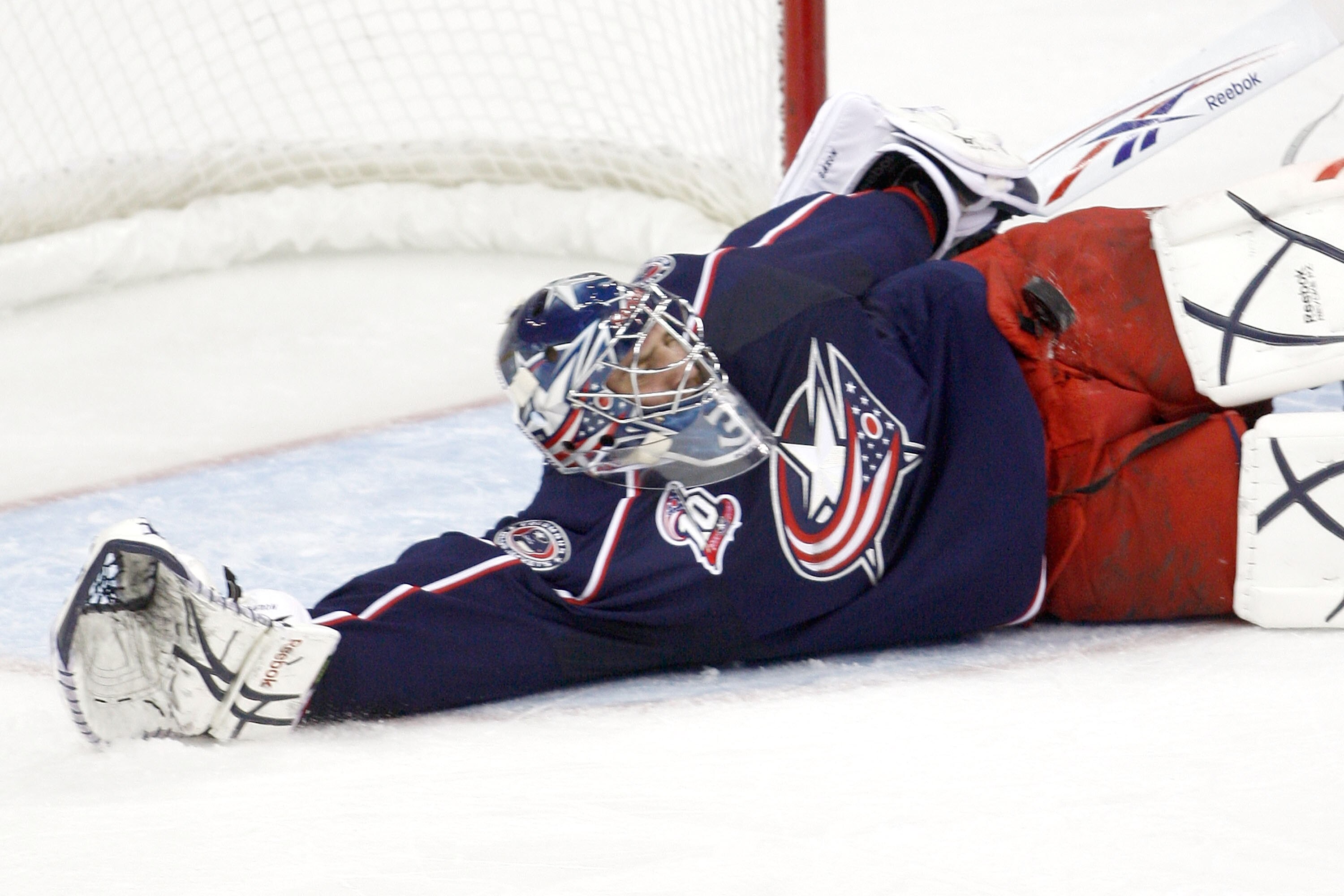 COLUMBUS,OH - NOVEMBER 2:  Goaltender Mathieu Garon #32 of the Columbus Blue Jackets makes one of his 29 saves during his 3-0 shutout of the Montreal Canadiens on November 2, 2010 at Nationwide Arena in Columbus, Ohio.  (Photo by John Grieshop/Getty Image