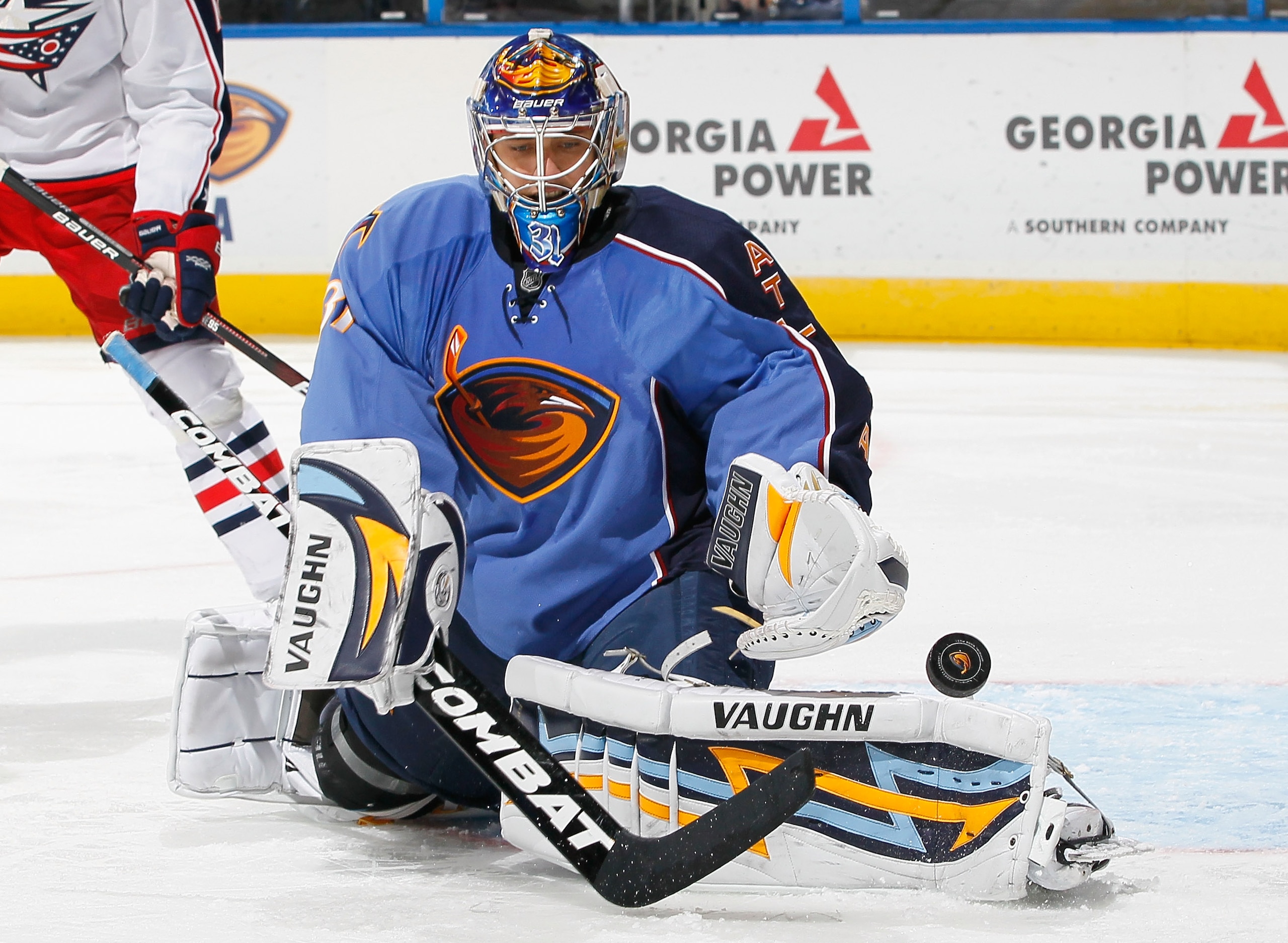 ATLANTA - NOVEMBER 04:  Goaltender Ondrej Pavelec #31 of the Atlanta Thrashers saves a shot on goal by the Columbus Blue Jackets at Philips Arena on November 4, 2010 in Atlanta, Georgia.  (Photo by Kevin C. Cox/Getty Images)