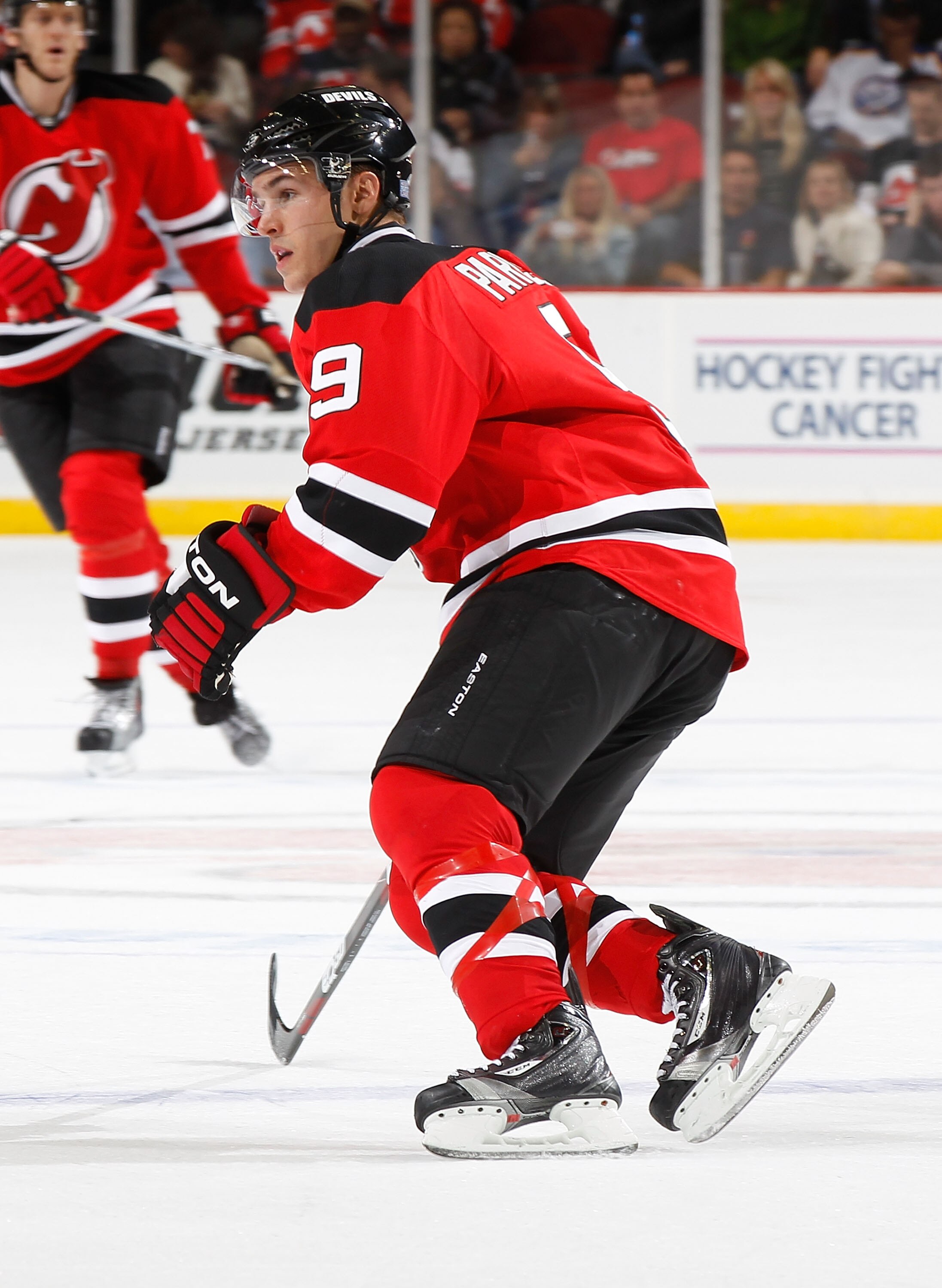 NEWARK, NJ - OCTOBER 23:  Zach Parise #9 of the New Jersey Devils skates against the Buffalo Sabres on October 23, 2010 at the Prudential Center in Newark, New Jersey. Sabres defeated the Devils 6-1.  (Photo by Mike Stobe/Getty Images)