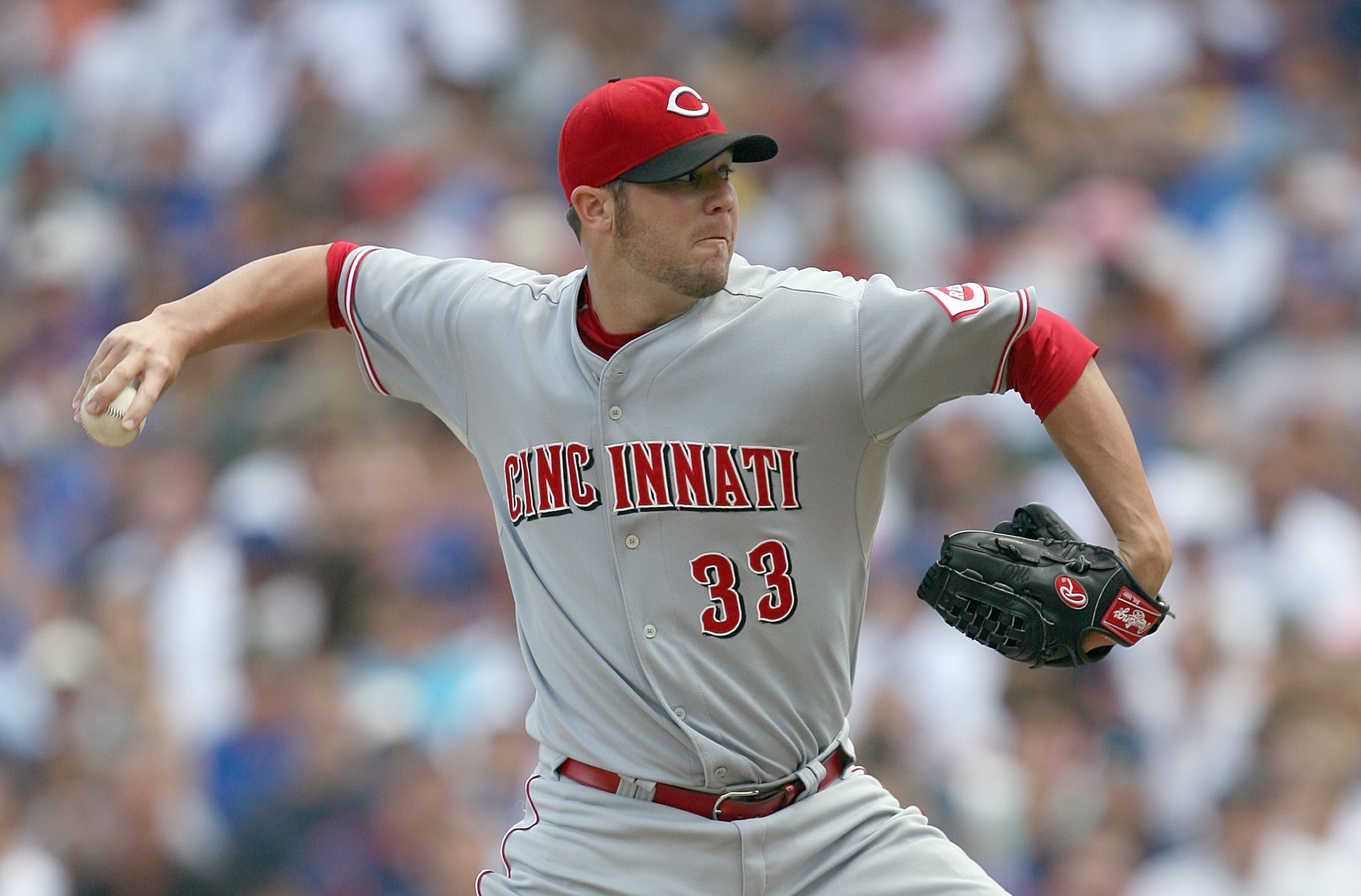 CHICAGO - JULY 26: Starting pitcher Micah Owings #33 of the Cincinnati Reds delivers the pitch during the game against the Chicago Cub on July 26, 2009 at Wrigley Field in Chicago, Illinois. The Cubs defeated the Reds 5-2. (Photo by Jonathan Daniel/Getty