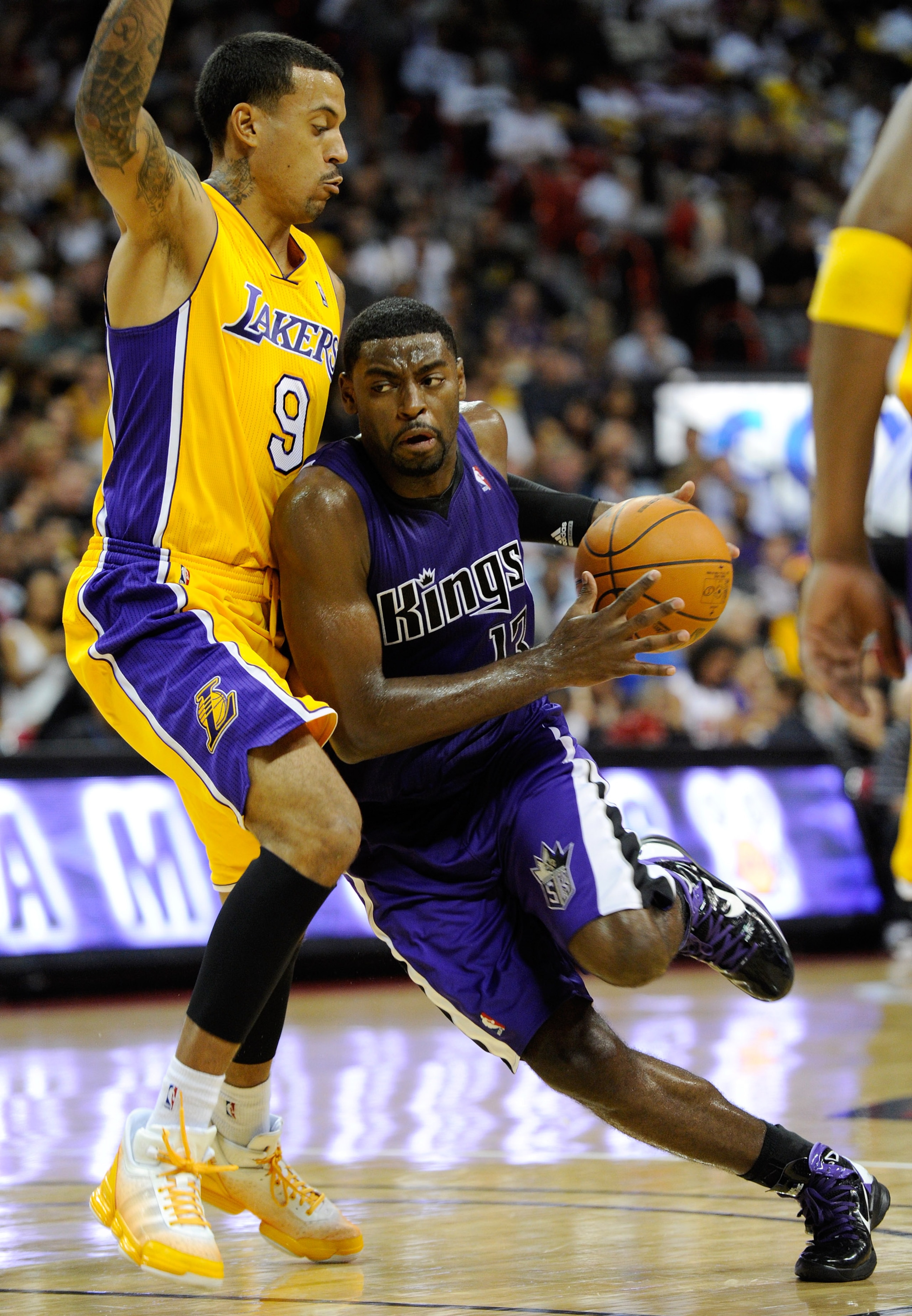 LAS VEGAS - OCTOBER 13:  Tyreke Evans #13 of the Sacramento Kings drives against Matt Barnes #9 of the Los Angeles Lakers during their preseason game at the Thomas & Mack Center October 13, 2010 in Las Vegas, Nevada. The Lakers won 98-95. NOTE TO USER: Us