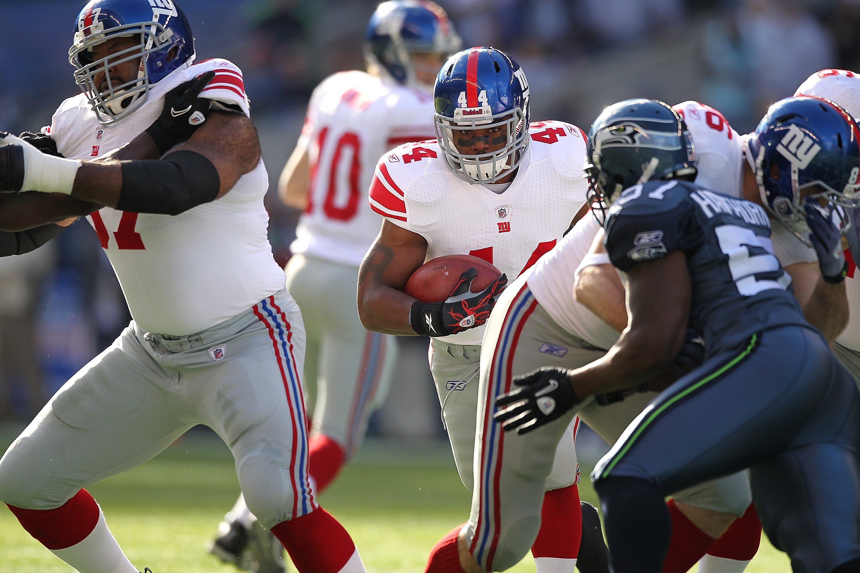 SEATTLE - NOVEMBER 07:  Running back Ahmad Bradshaw #44 of the New York Giants rushes against the Seattle Seahawks at Qwest Field on November 7, 2010 in Seattle, Washington. The Giants defeated the Seahawks 41-7. (Photo by Otto Greule Jr/Getty Images)