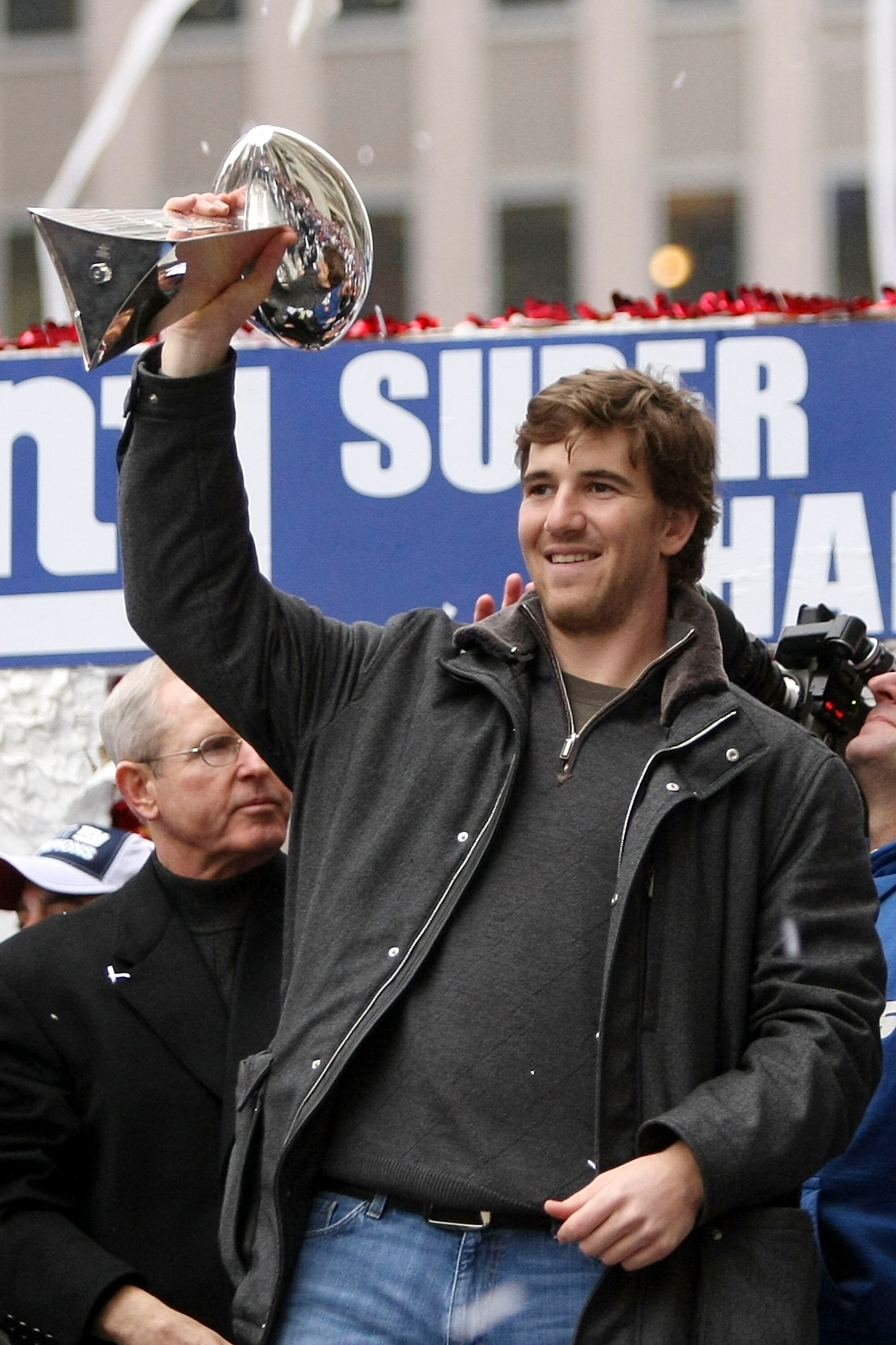 NEW YORK - FEBRUARY 05:  New York Giants quarterback Eli Manning holds up the Vince Lombardi trophy during the New York Giants Superbowl XLII victory parade February 5, 2008 in New York City.  (Photo by Chris McGrath/Getty Images)