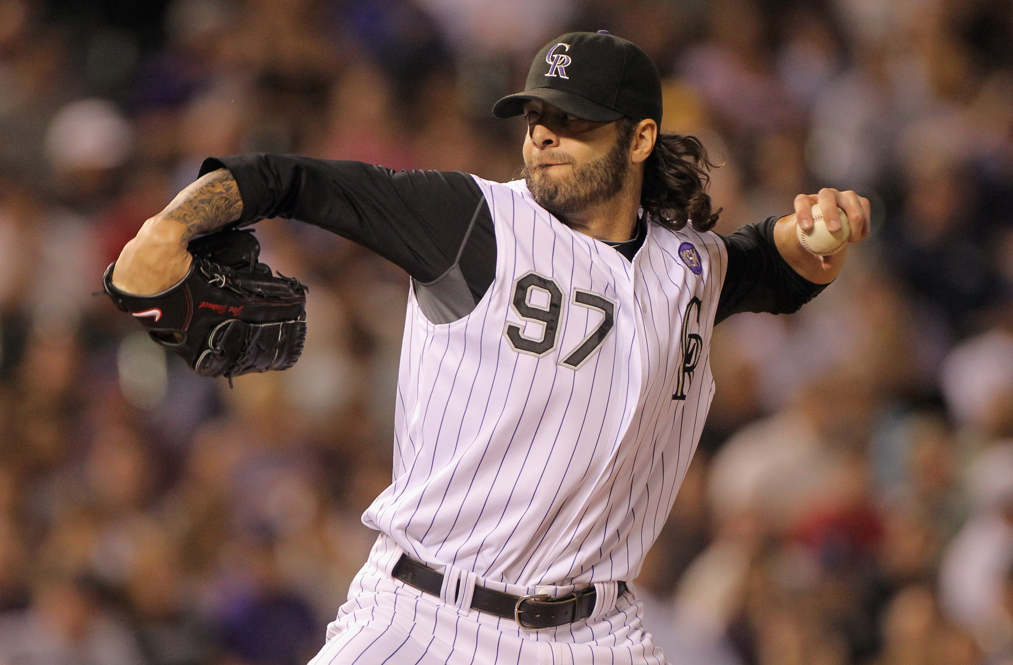 DENVER - SEPTEMBER 13:  Relief pitcherJoe Beimel #97 of the Colorado Rockies delivers against the San Diego Padres at Coors Field on September 13, 2010 in Denver, Colorado.  (Photo by Doug Pensinger/Getty Images)