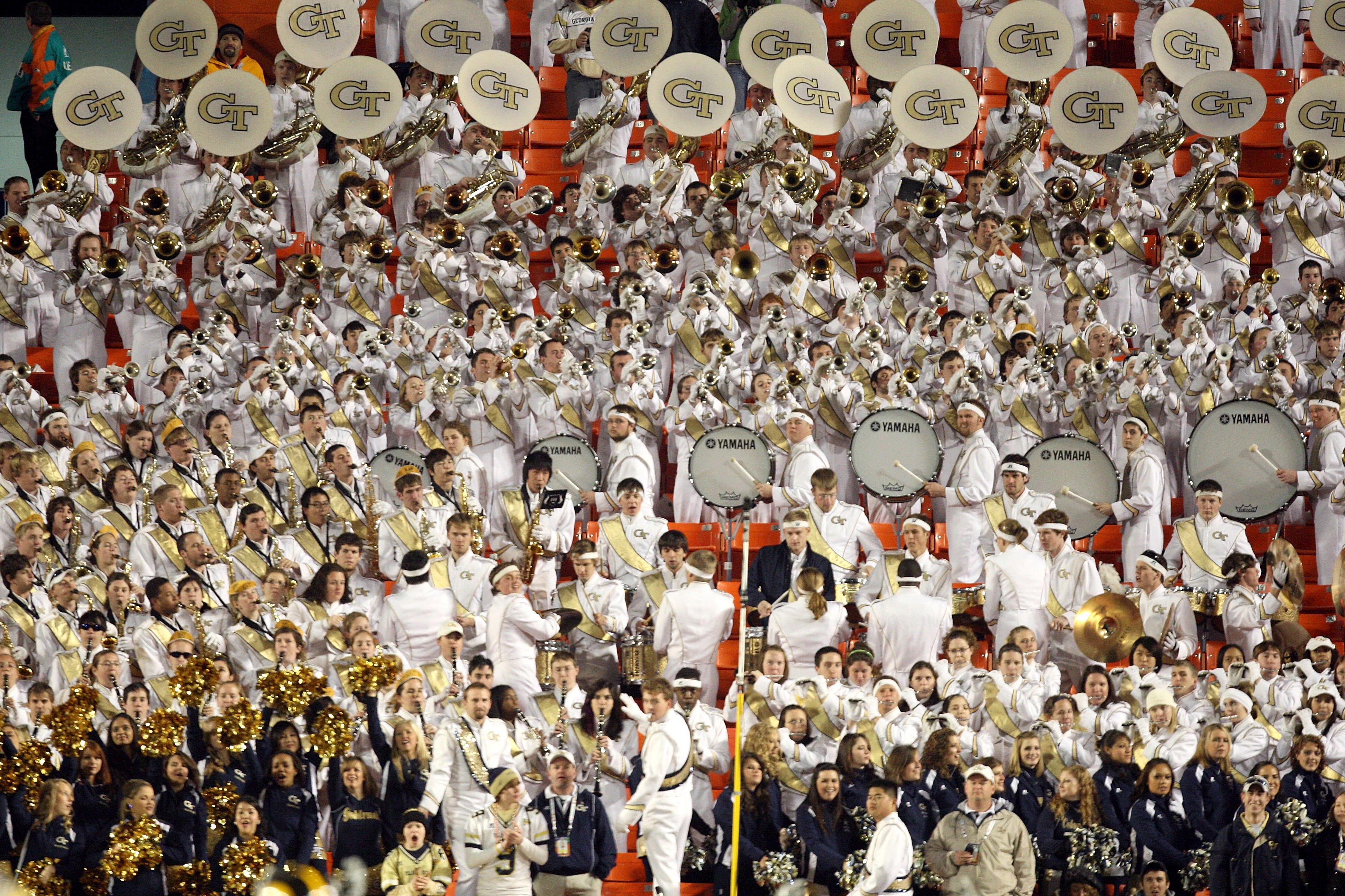 MIAMI GARDENS, FL - JANUARY 05:  The marching band for the Georgia Tech Yellow Jackets performs in the stands against the Iowa Hawkeyes during the FedEx Orange Bowl at Land Shark Stadium on January 5, 2010 in Miami Gardens, Florida.  (Photo by Streeter Le