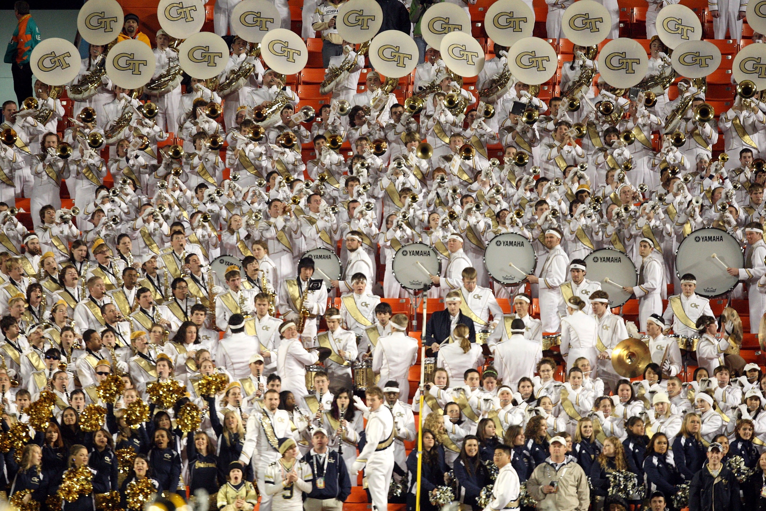 MIAMI GARDENS, FL - JANUARY 05:  The marching band for the Georgia Tech Yellow Jackets performs in the stands against the Iowa Hawkeyes during the FedEx Orange Bowl at Land Shark Stadium on January 5, 2010 in Miami Gardens, Florida.  (Photo by Streeter Le