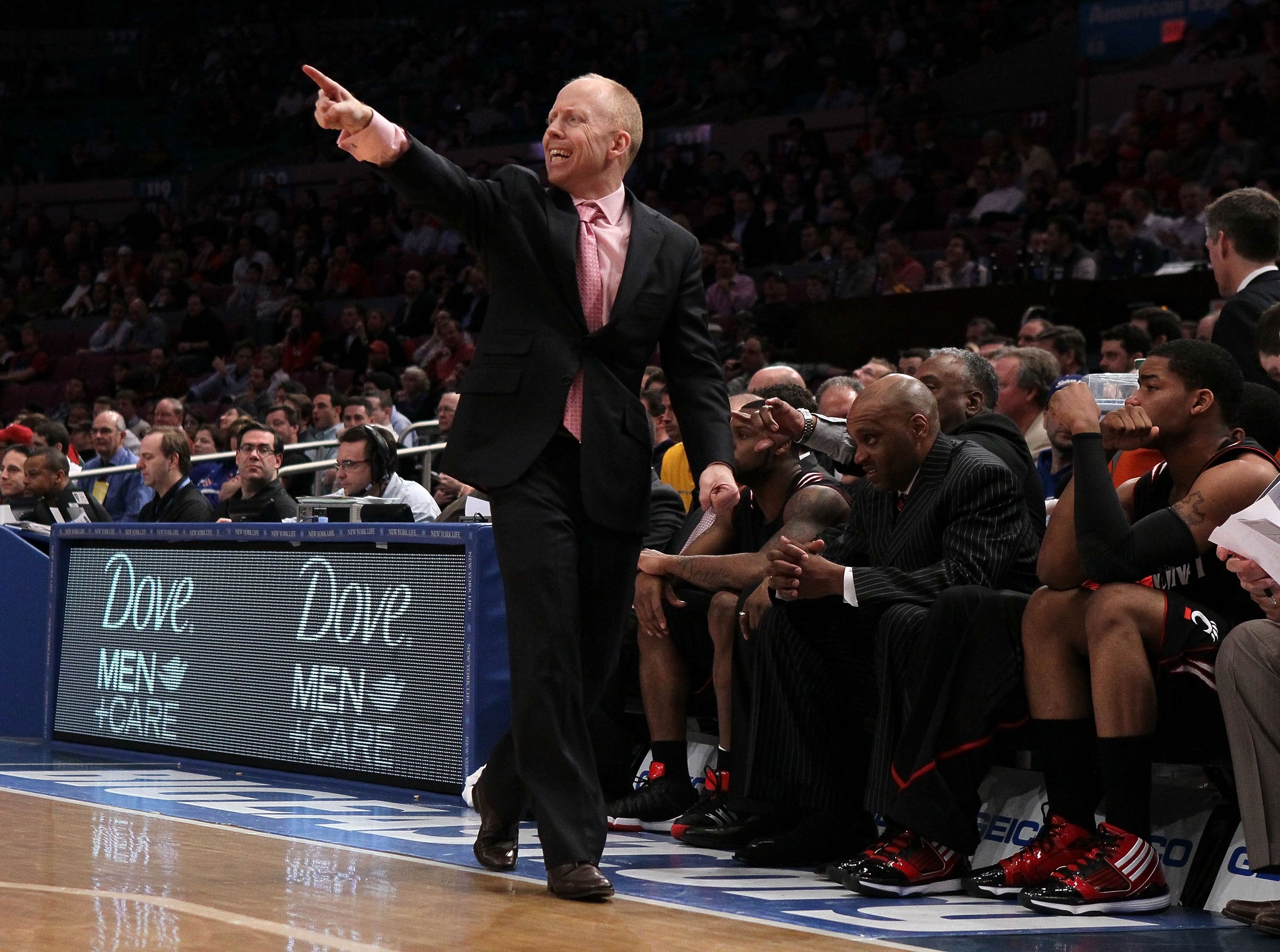 NEW YORK - MARCH 10:  Head coach Mick Cronin of the Cincinnati Bearcats gestures from the bench against the Louisville Cardinals during the second round of 2010 NCAA Big East Tournament at Madison Square Garden on March 10, 2010 in New York City.  (Photo