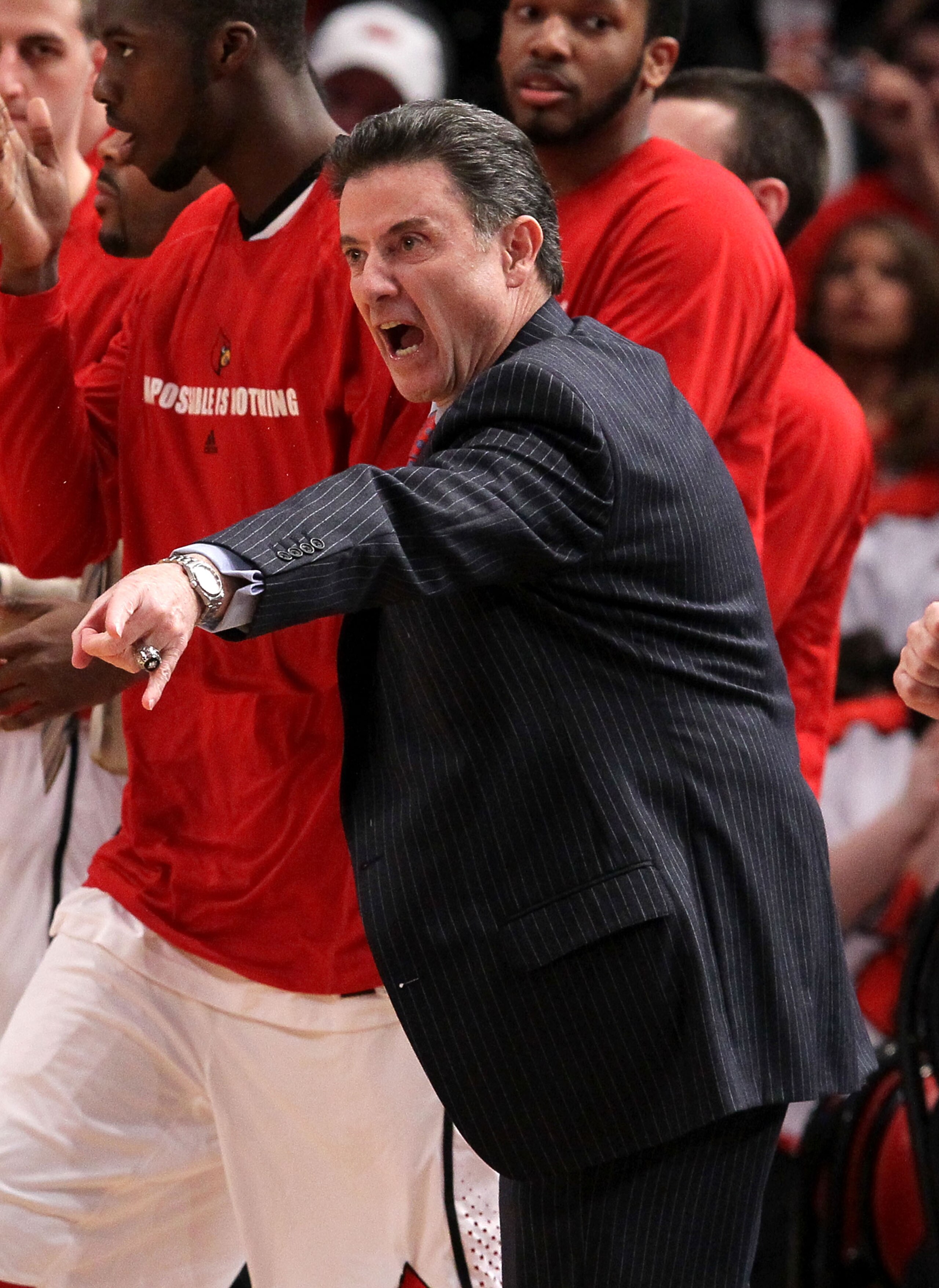 NEW YORK - MARCH 10:  Head coach Rick Pitino of the Louisville Cardinals reacts from the bench against the Cincinnati Bearcats during the second round of 2010 NCAA Big East Tournament at Madison Square Garden on March 10, 2010 in New York City.  (Photo by