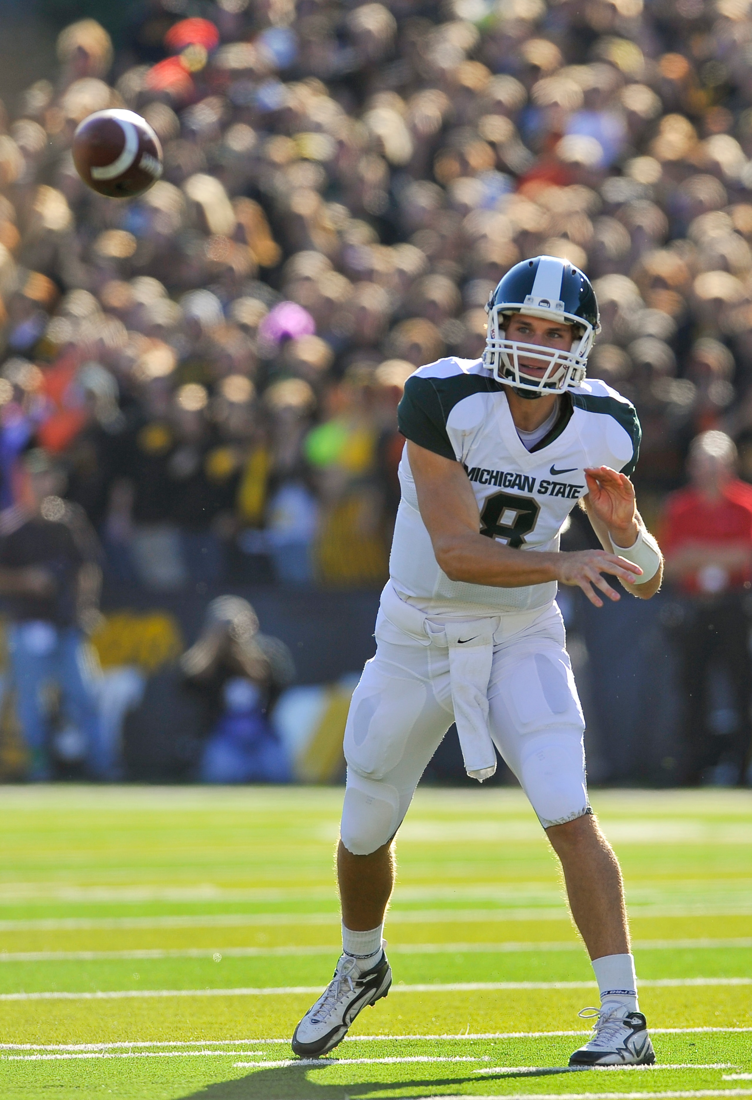 IOWA CITY, IA - OCTOBER 30- Quarterback Kirk Cousins #8 of the Michigan State Spartans throws a pass down field to a receiver during play against the University of Iowa Hawkeyes at Kinnick Stadium on October 30, 2010 in Iowa City, Iowa. Iowa won 37-6 over