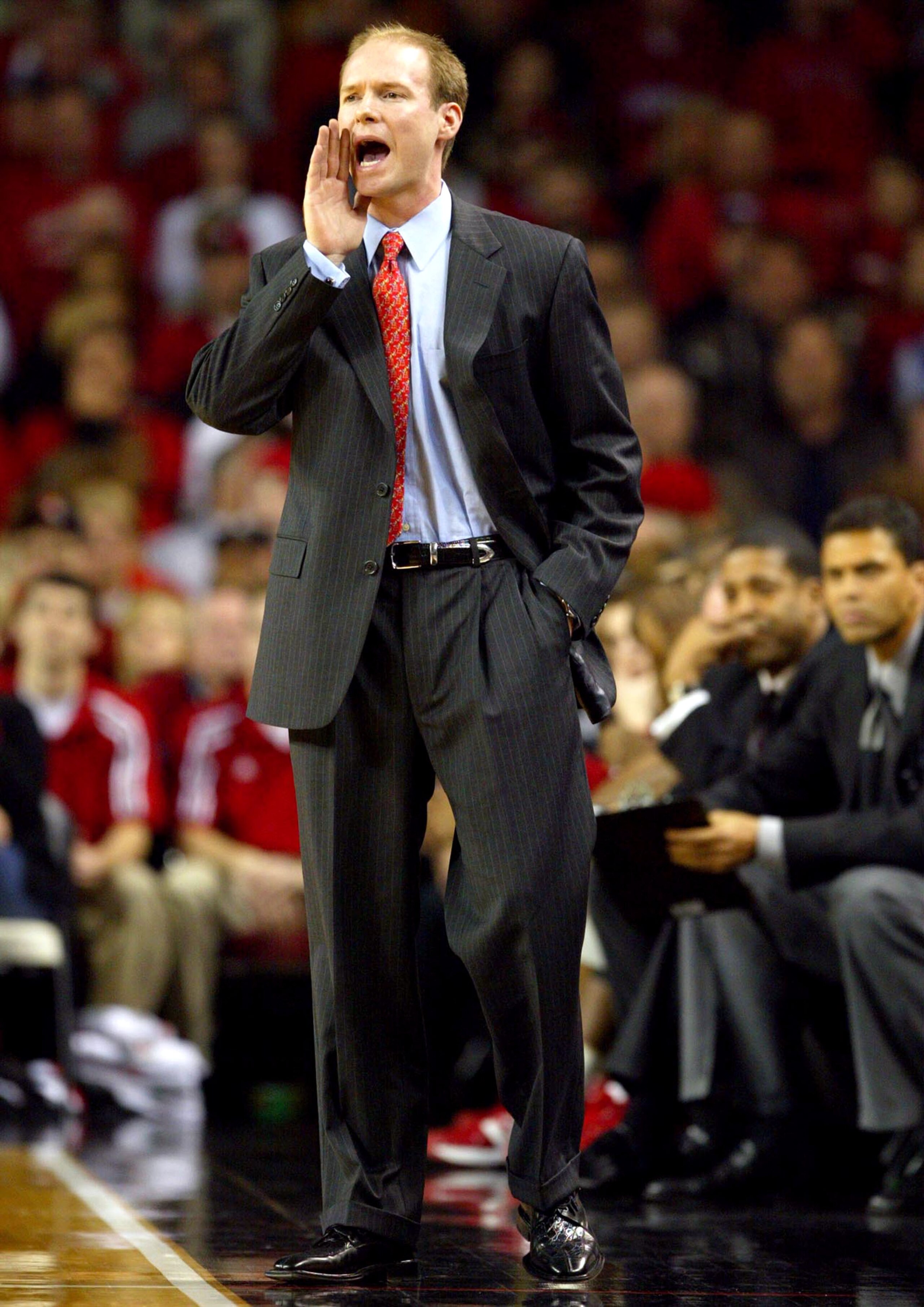 LOUISVILLE, KY - JANUARY 28:  Kevin Willard the acting Head Coach of Louisville gives instructions to his team against Houston on January 28, 2004 at Freedom Hall in Louisville, Kentucky. Willard was filling in for Rick Pitino who was out for medical reas