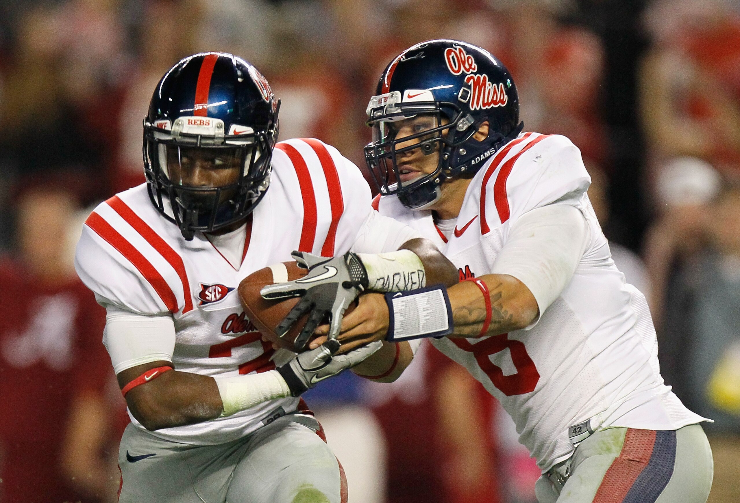 TUSCALOOSA, AL - OCTOBER 16:  Quarterback Jeremiah Masoli #8 and Jeff Scott #3 of the Ole Miss Rebels against the Alabama Crimson Tide at Bryant-Denny Stadium on October 16, 2010 in Tuscaloosa, Alabama.  (Photo by Kevin C. Cox/Getty Images)