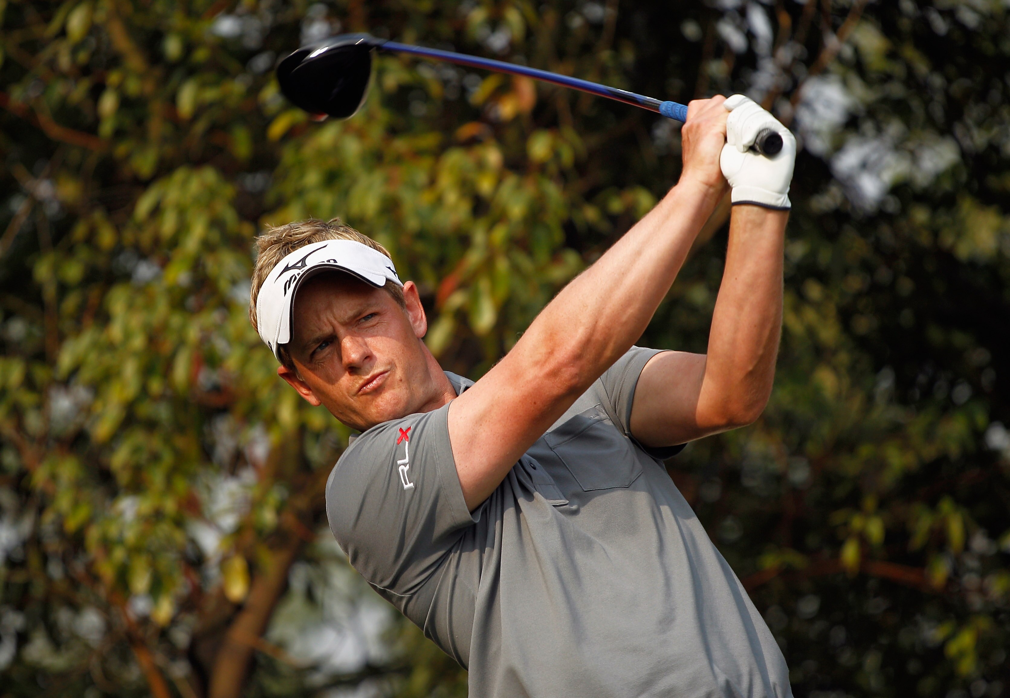 SHANGHAI, CHINA - NOVEMBER 07:  Luke Donald of England watches his tee shot on the ninth hole during the final round of the WGC-HSBC Champions at the Sheshan Golf Club on November 7, 2010 in Shanghai, China.  (Photo by Scott Halleran/Getty Images)