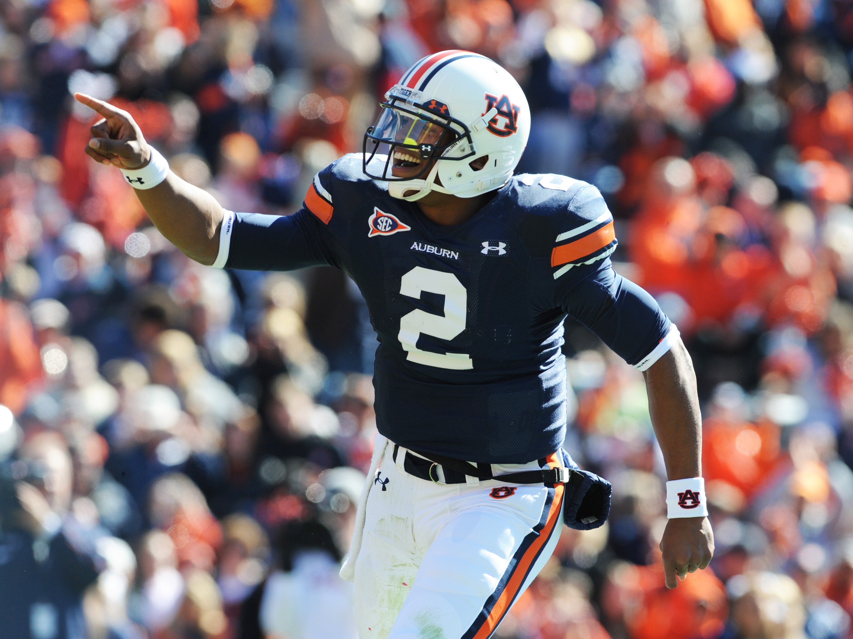 AUBURN, AL - NOVEMBER 6:  Quarterback Cam Newton #2 of the Auburn Tigers celebrates a touchdown run against the Chattanooga Mocs November 6, 2010 at Jordan-Hare Stadium in Auburn, Alabama.  (Photo by Al Messerschmidt/Getty Images)