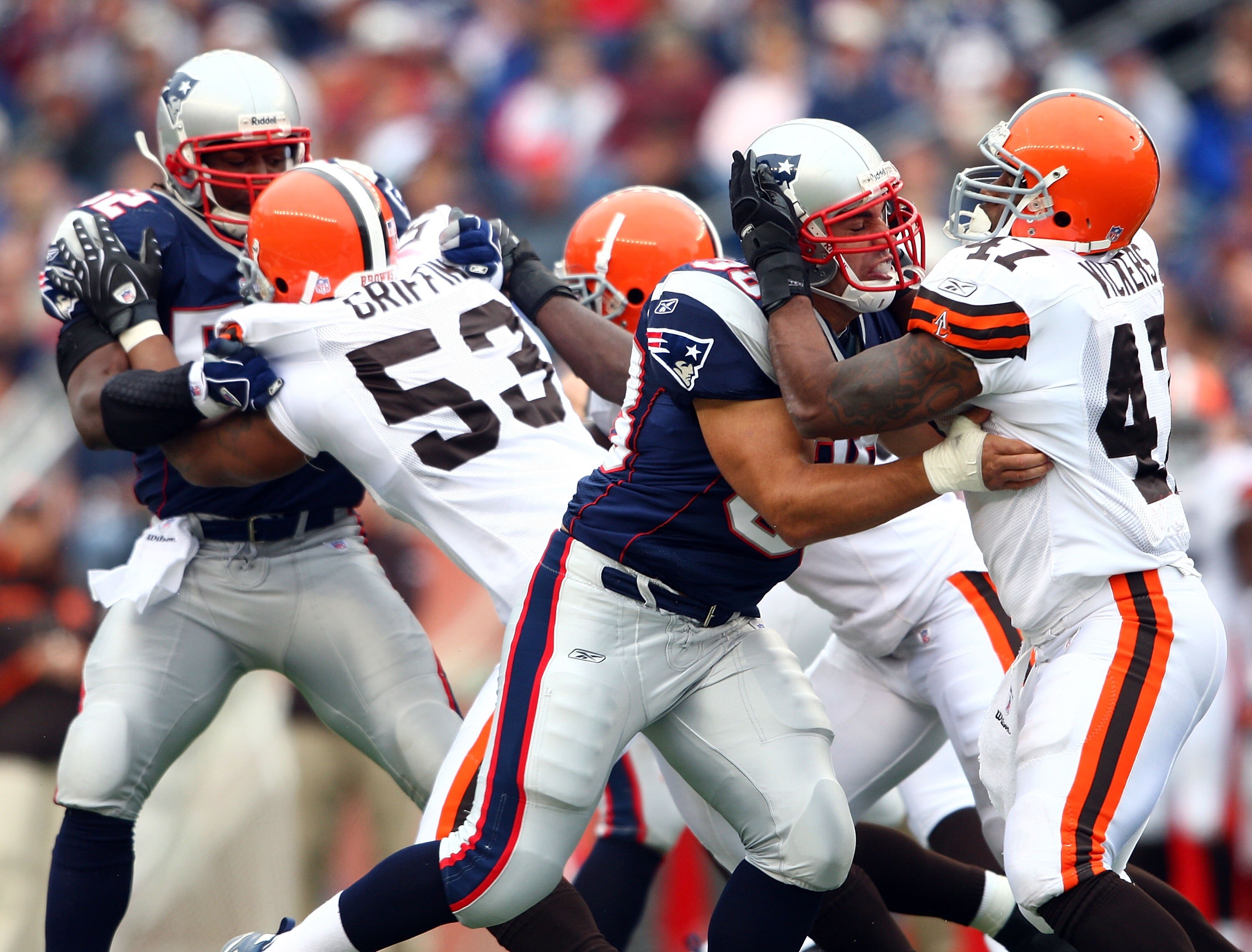 FOXBORO, MA - OCTOBER 07:  James Sanders #36 of the New England Patriots tries to hold back Lawrence Vickers #47 of the Cleveland Browns on October 7, 2007 at Gillette Stadium in Foxboro, Massachusetts. The Patriots defeated the Browns 34-17.  (Photo by E